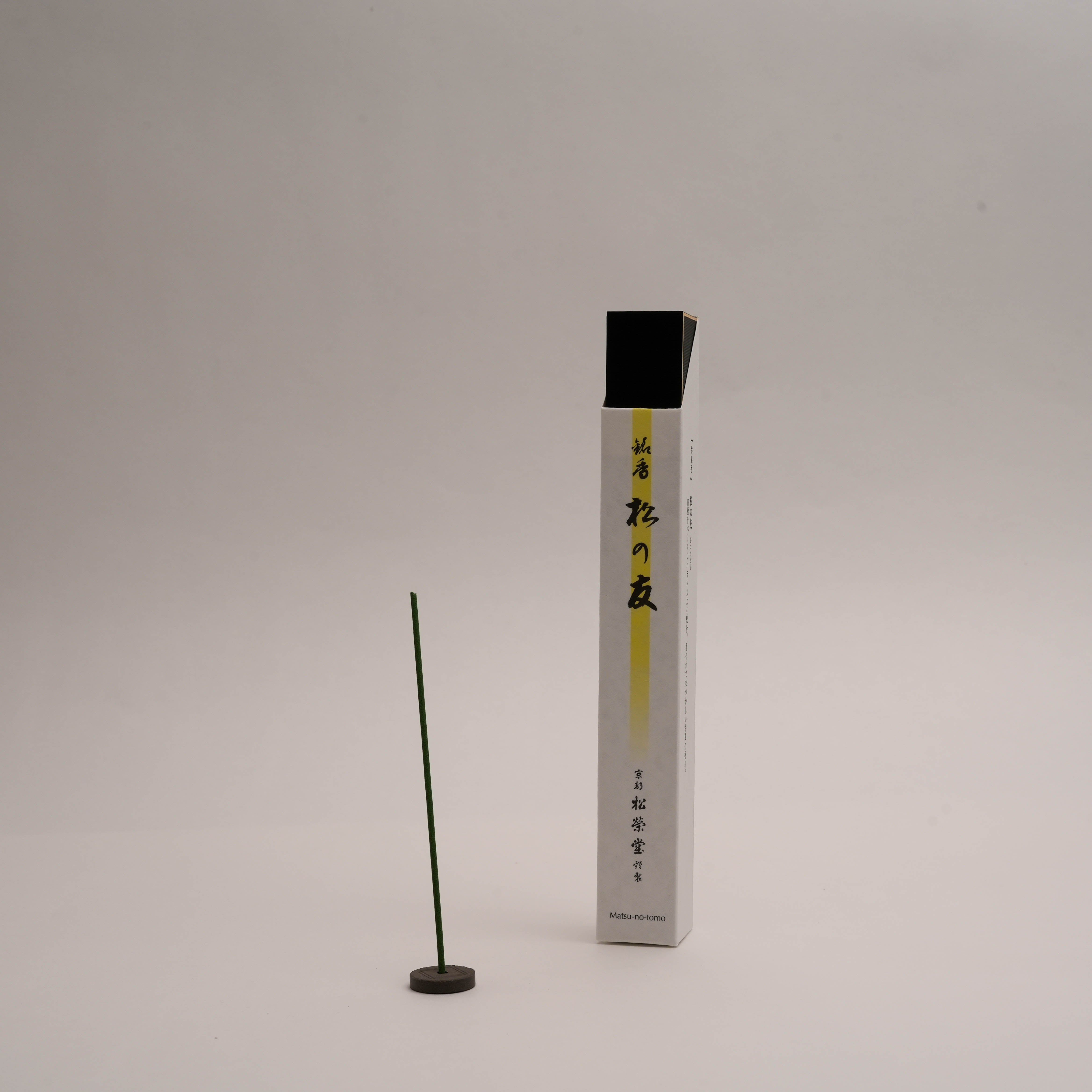 Shoyeido Incense - Friend of Pine displayed with a single incense stick and holder, featuring sandalwood, clove, and patchouli blend.