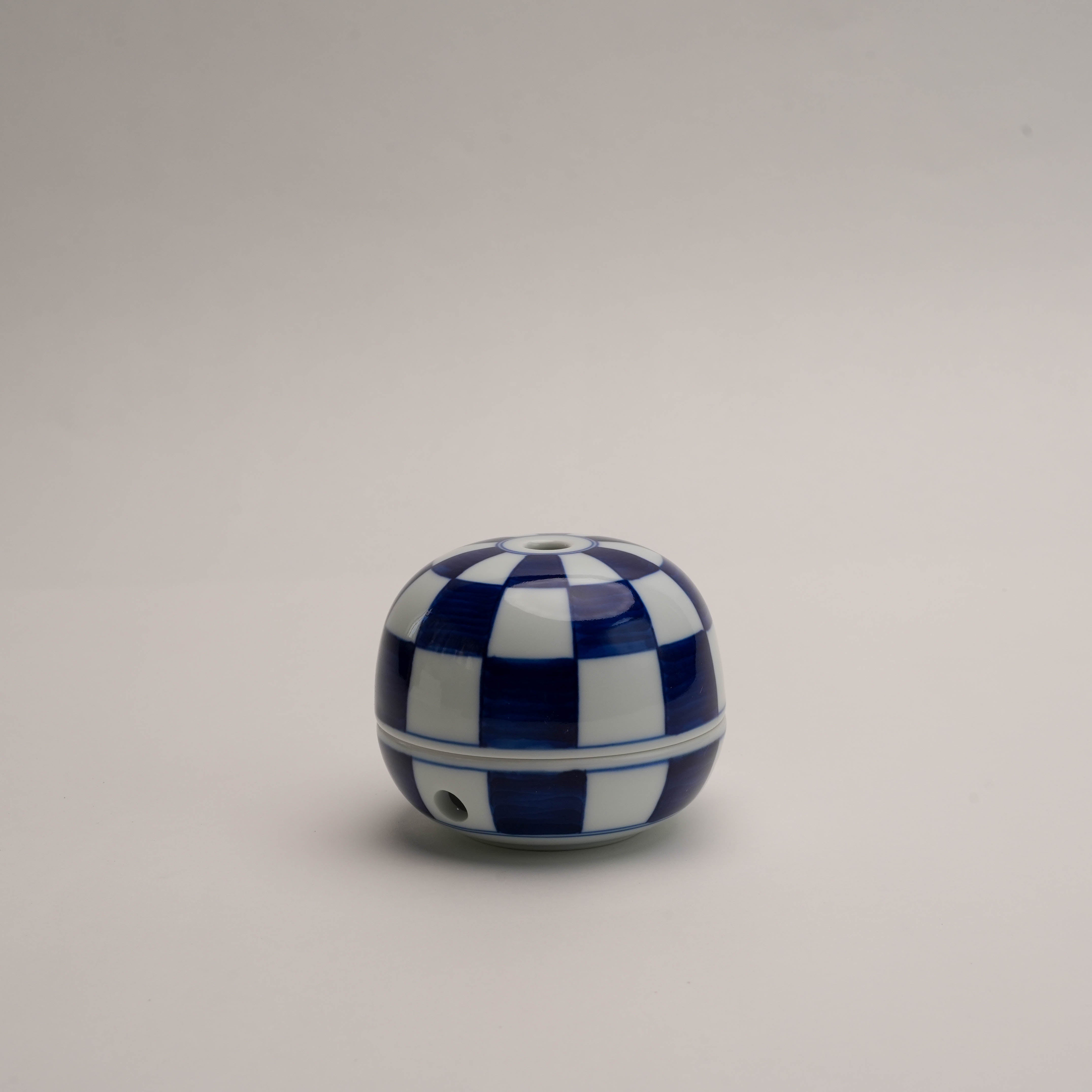 Miyuki Stone Incense Burner by Shoyeido with blue and white checkered dome design, ideal for stylish home fragrance decor.