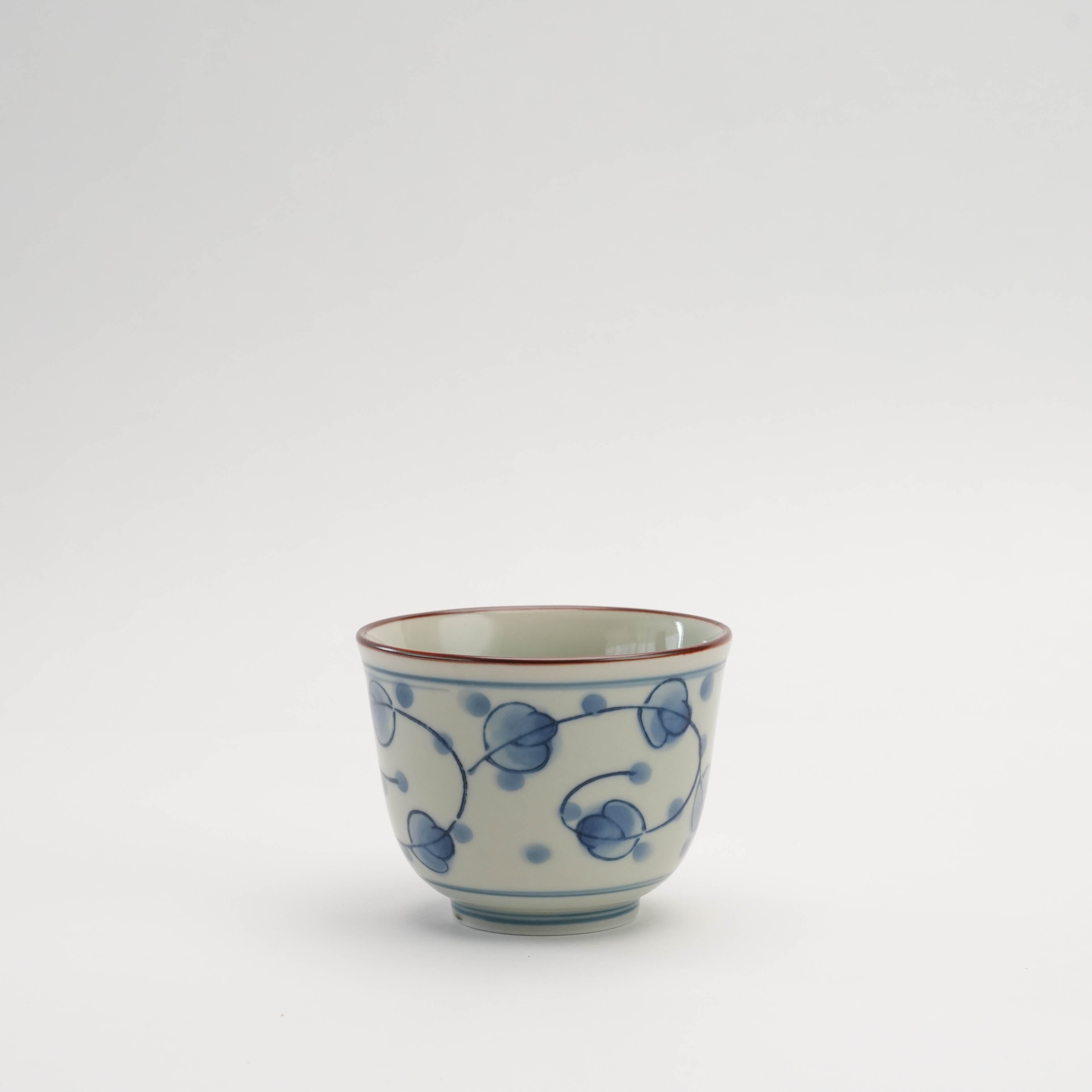 Arita Ware Tea Cup - Miyakogusa Ceramic with classic blue floral design and red rim, perfect for green tea rituals, 7.8cm × 6cm.