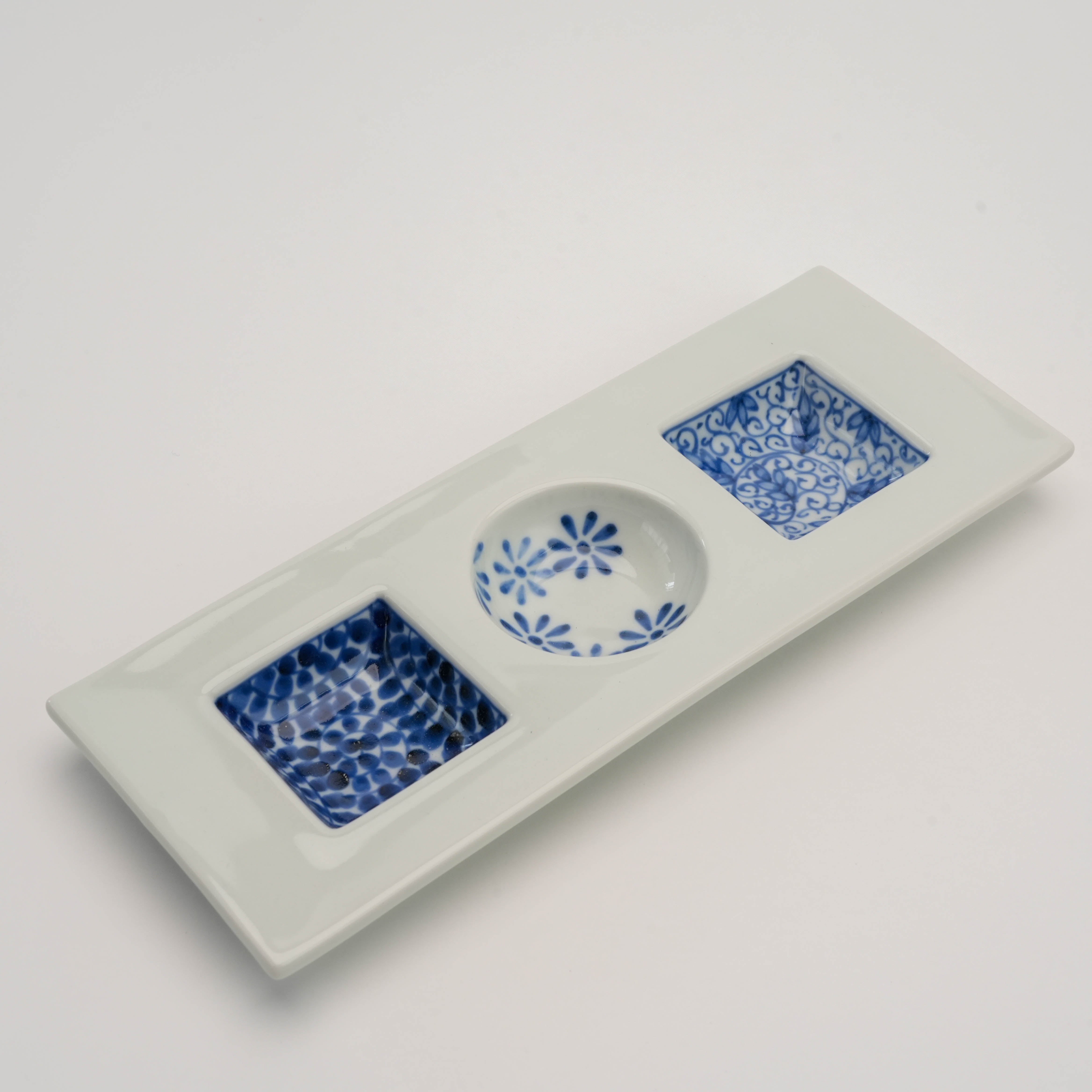 Sometsuke Serving Dish - Triple Dish with floral, dotted, and scroll patterns in blue on white Arita ware ceramic. Ideal for condiments or appetizers.