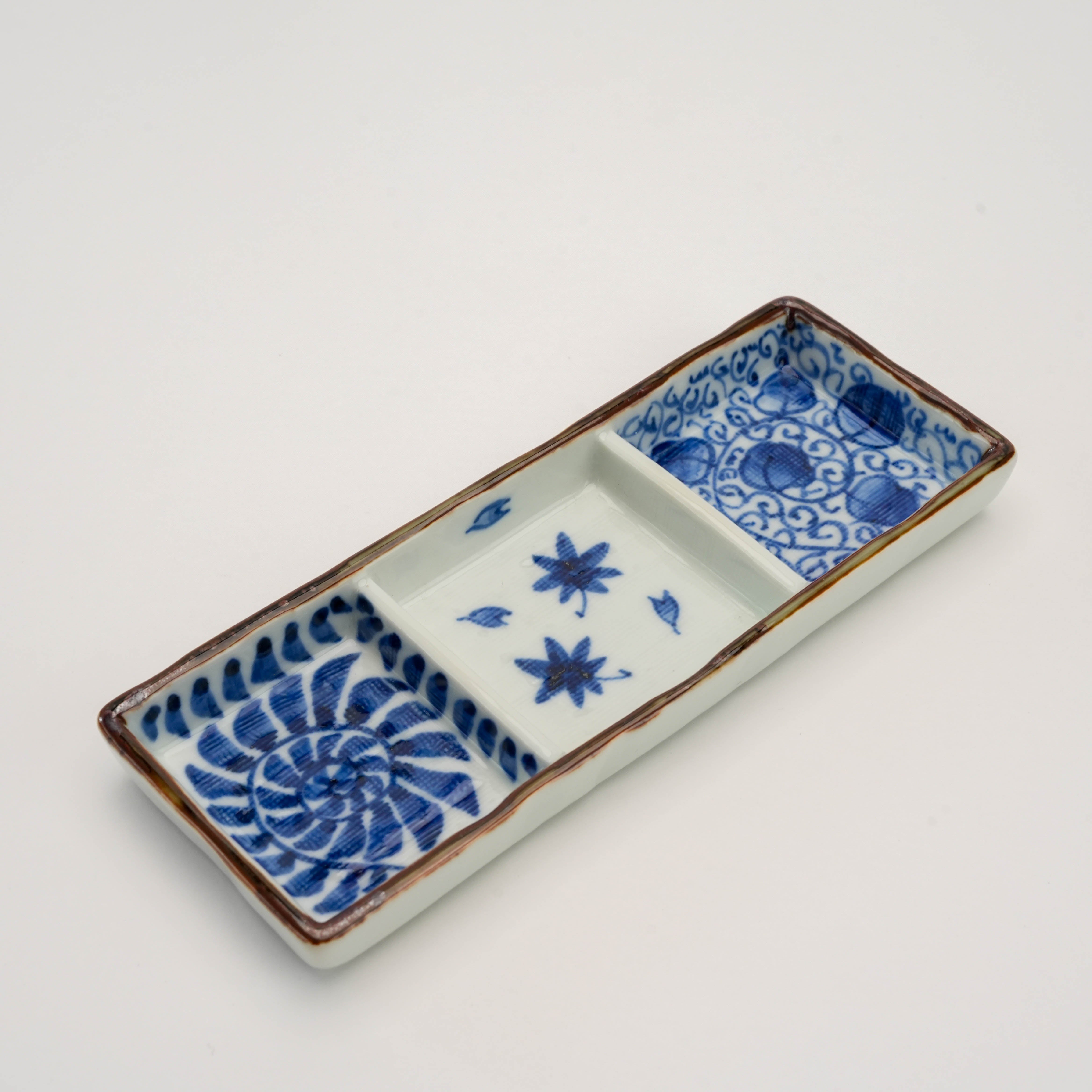 Arita Ware Triple Pattern Dish - Triple Dish | Kosome Indigo features three hand-painted indigo designs in a rectangular ceramic serveware piece.