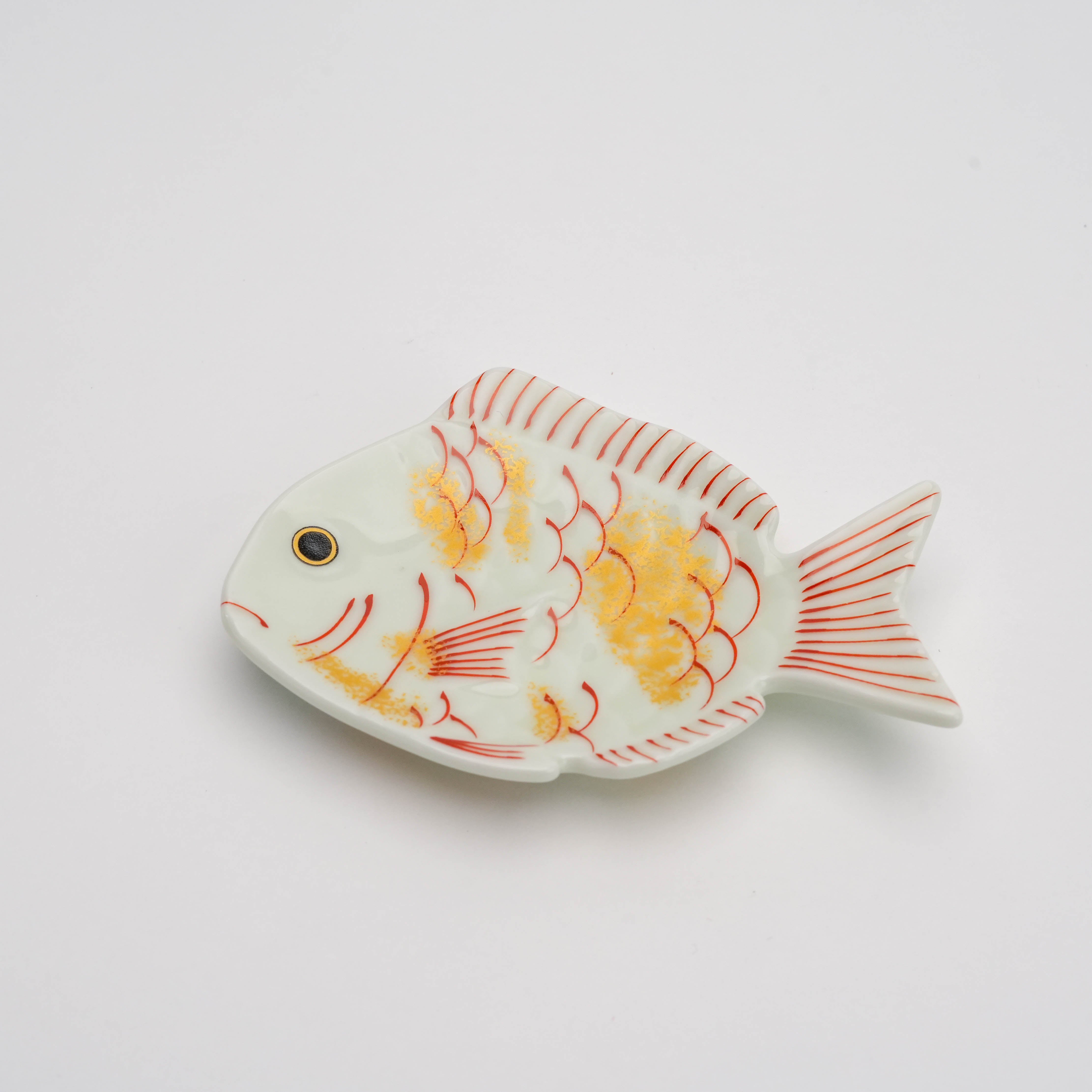 Arita Ware Small Dish shaped like a bream with gold and red accents, symbolizing good luck; ideal for festive decor or serving small items.