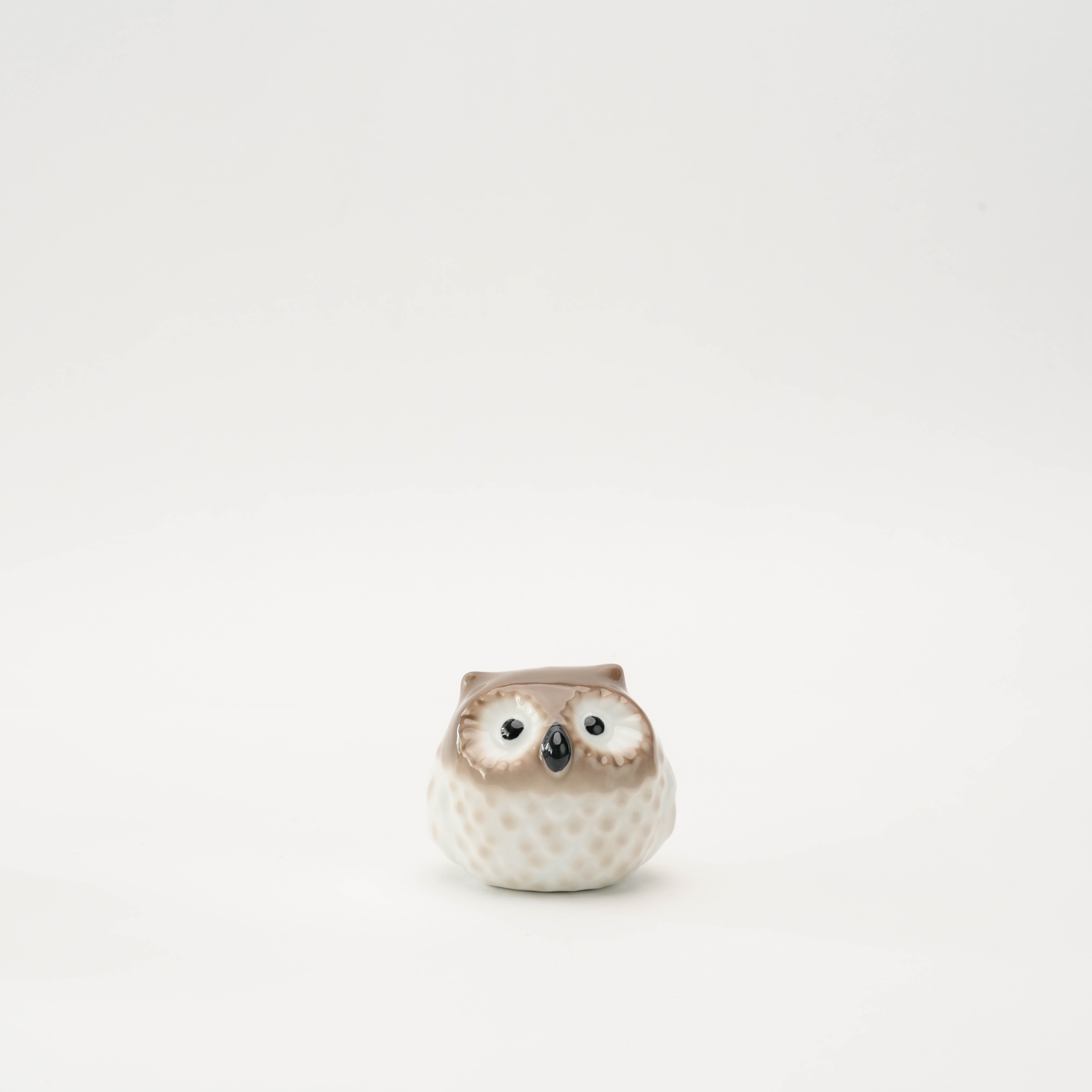 Small Arita Ware Housuke Owl Figurine with hand-painted feather texture and glossy finish, ideal for shelf or tabletop display.