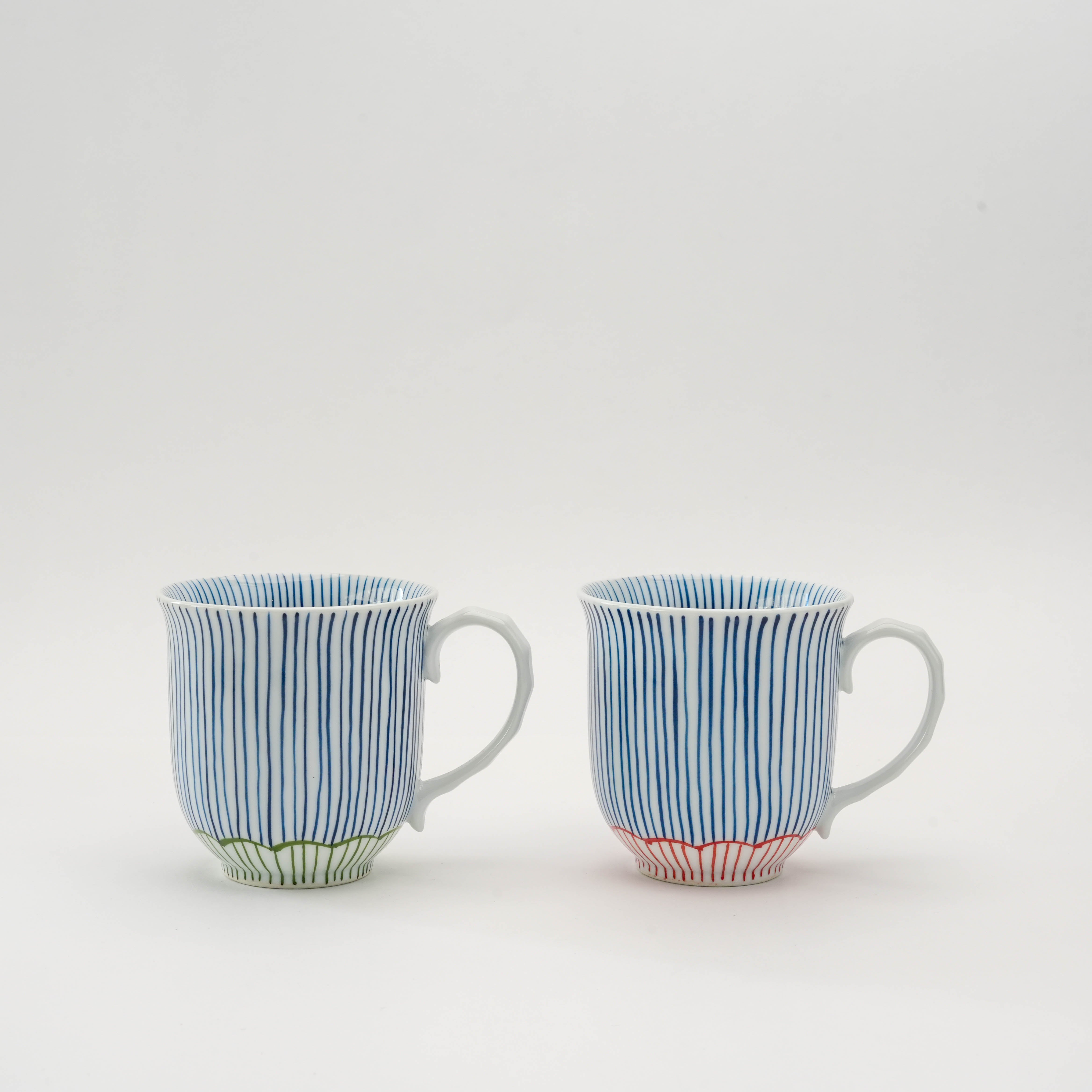 Arita Ware Mug Set - Japanese Mug | Traditional Pair Design featuring two hand-painted mugs with blue vertical stripes and colored bases in red and green.
