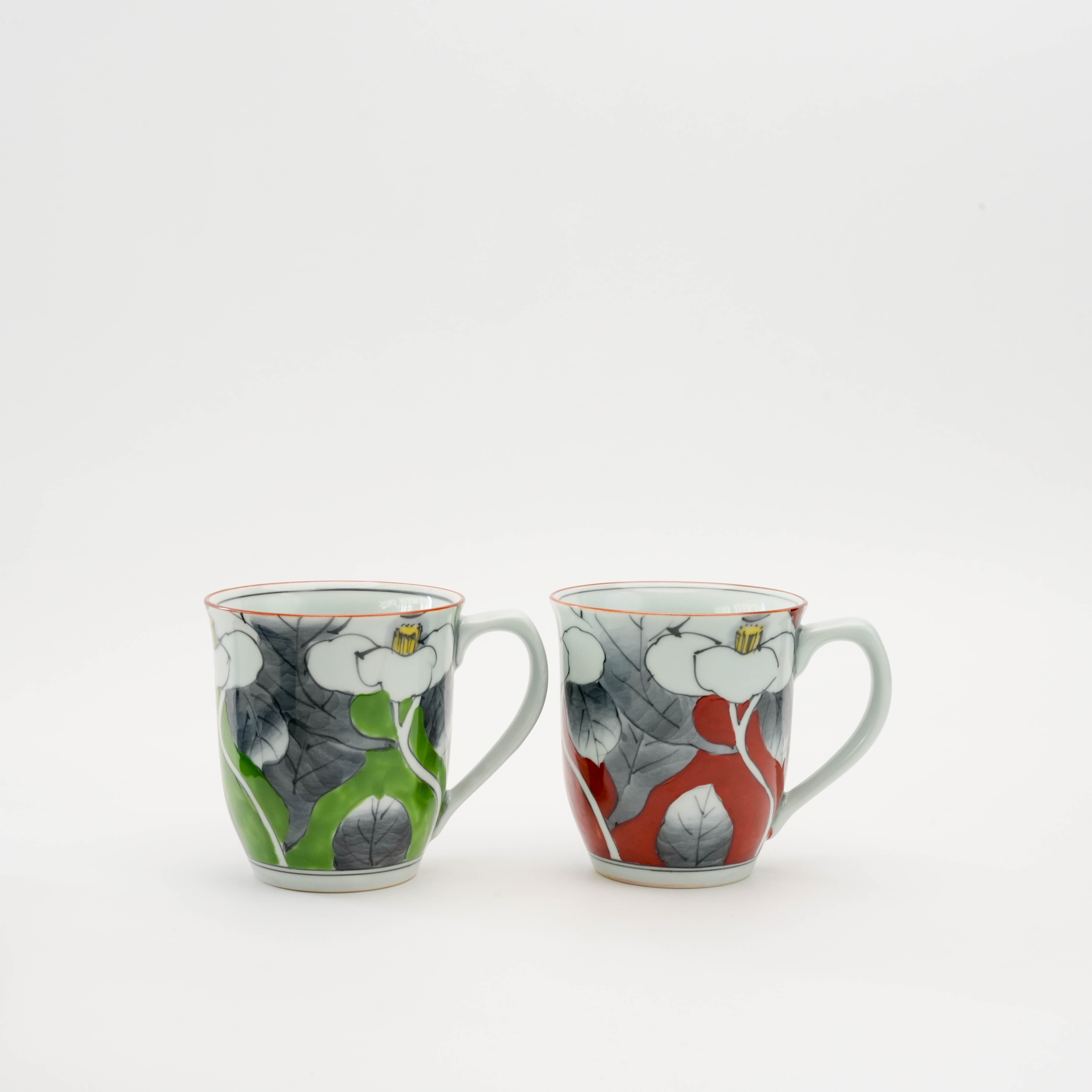 Arita Ware Pair Mug Set featuring red and green Sometsuke camellia floral design, perfect for Japanese tea lovers and elegant tableware collections.