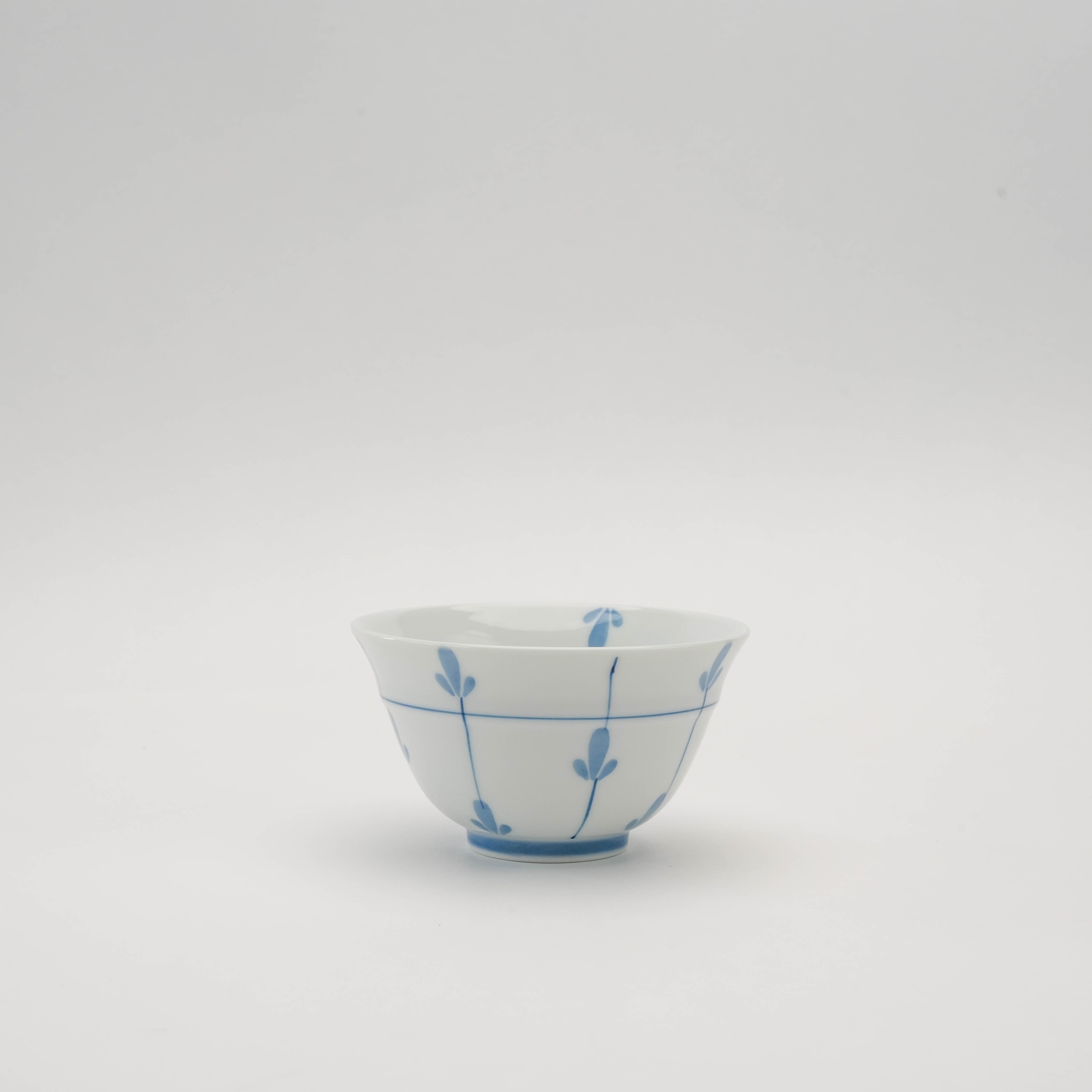 Arita Ware Sprout Sencha Tea Cup with hand-painted blue sprout design on white porcelain. Ideal for serving Japanese green tea.
