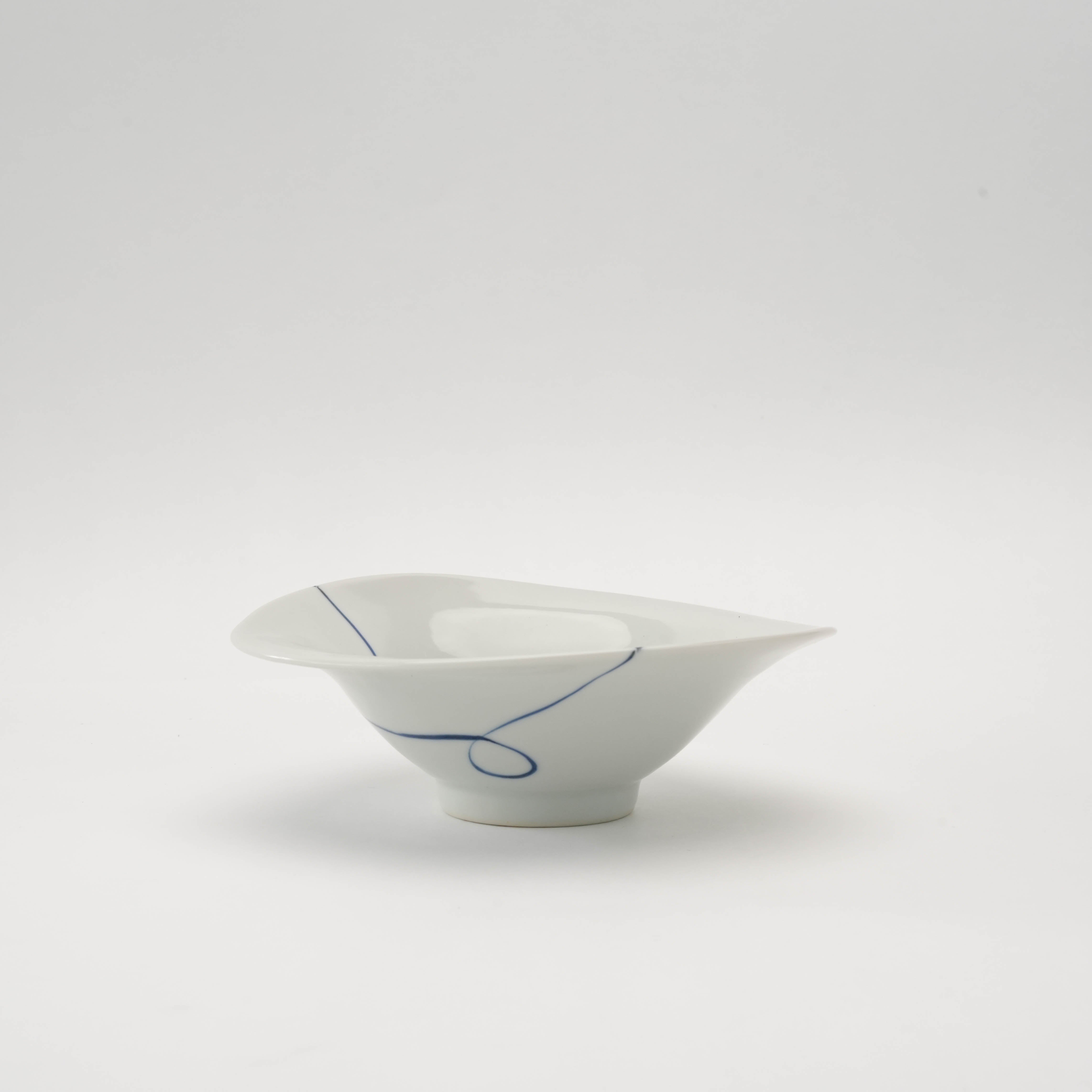 Arita Ware Twisted Small Bowl - Unique asymmetrical porcelain bowl with hand-painted indigo line, ideal for serving desserts or small salads.