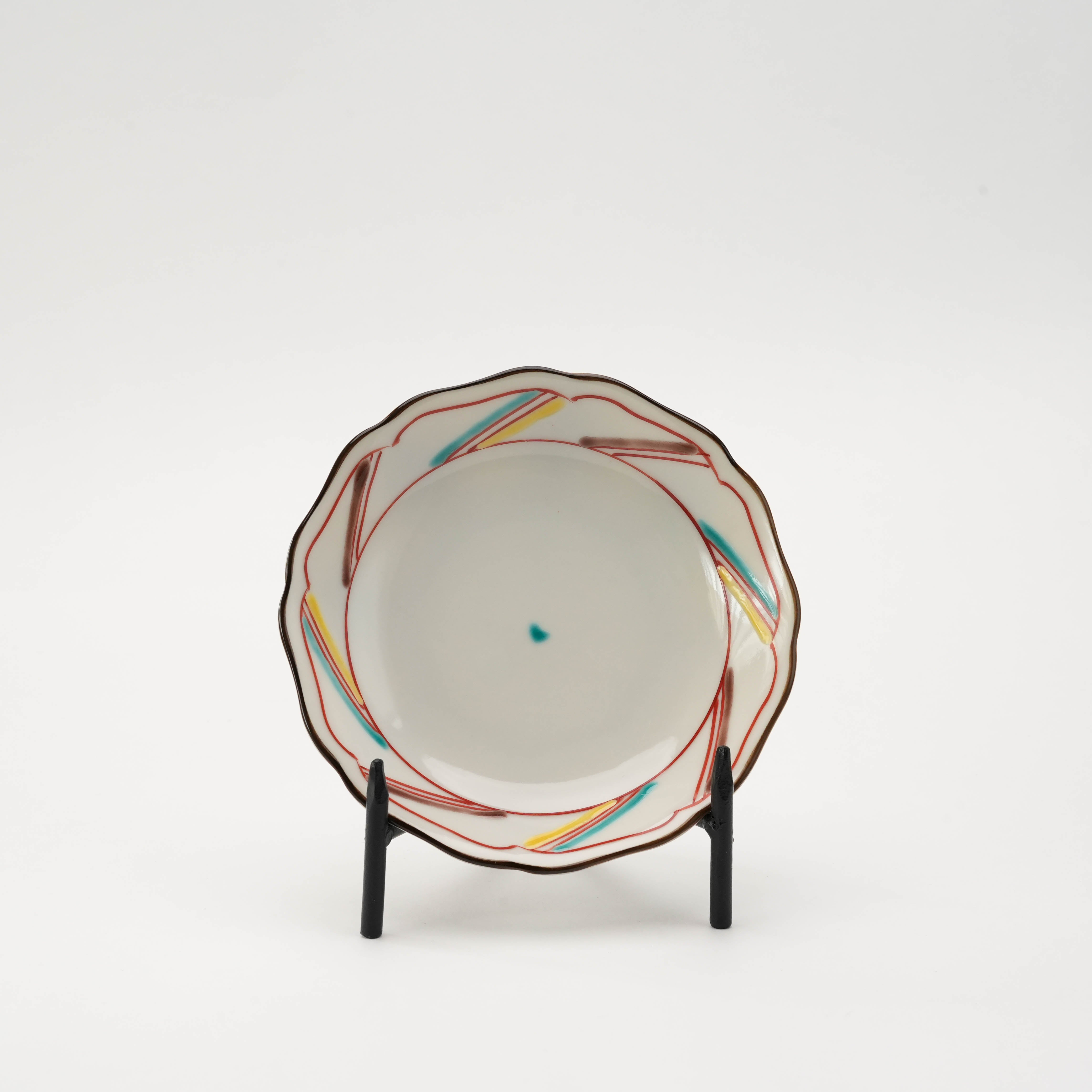 Single Kutani Ware small plate with abstract red and yellow Iroe design, 12.3 cm diameter, traditional Japanese craftsmanship.