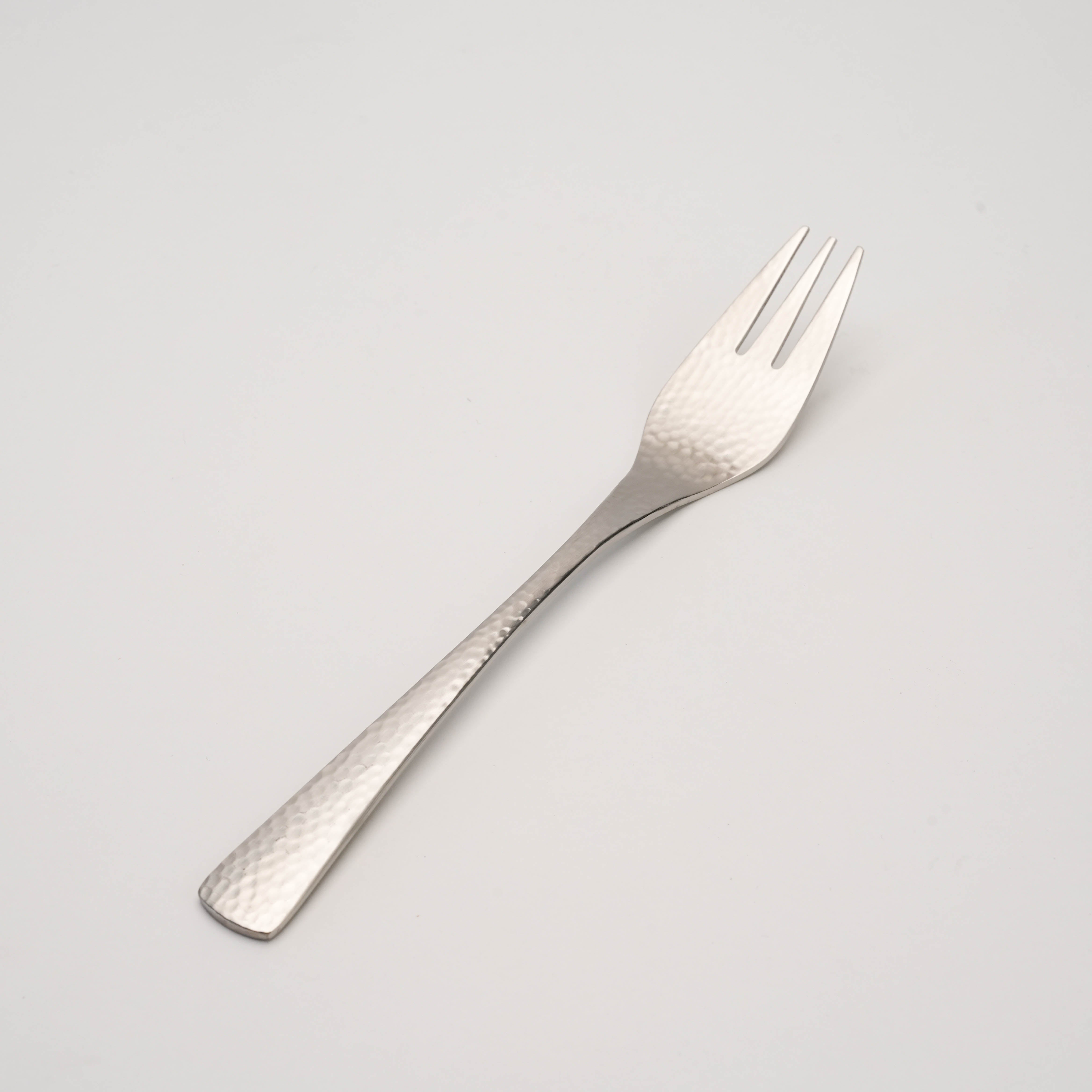 Tsubamesanjo Nagomi Fork - Hammered Finish | Japanese Craft flatware fork with a hand-hammered stainless steel texture, ideal for elegant dining.