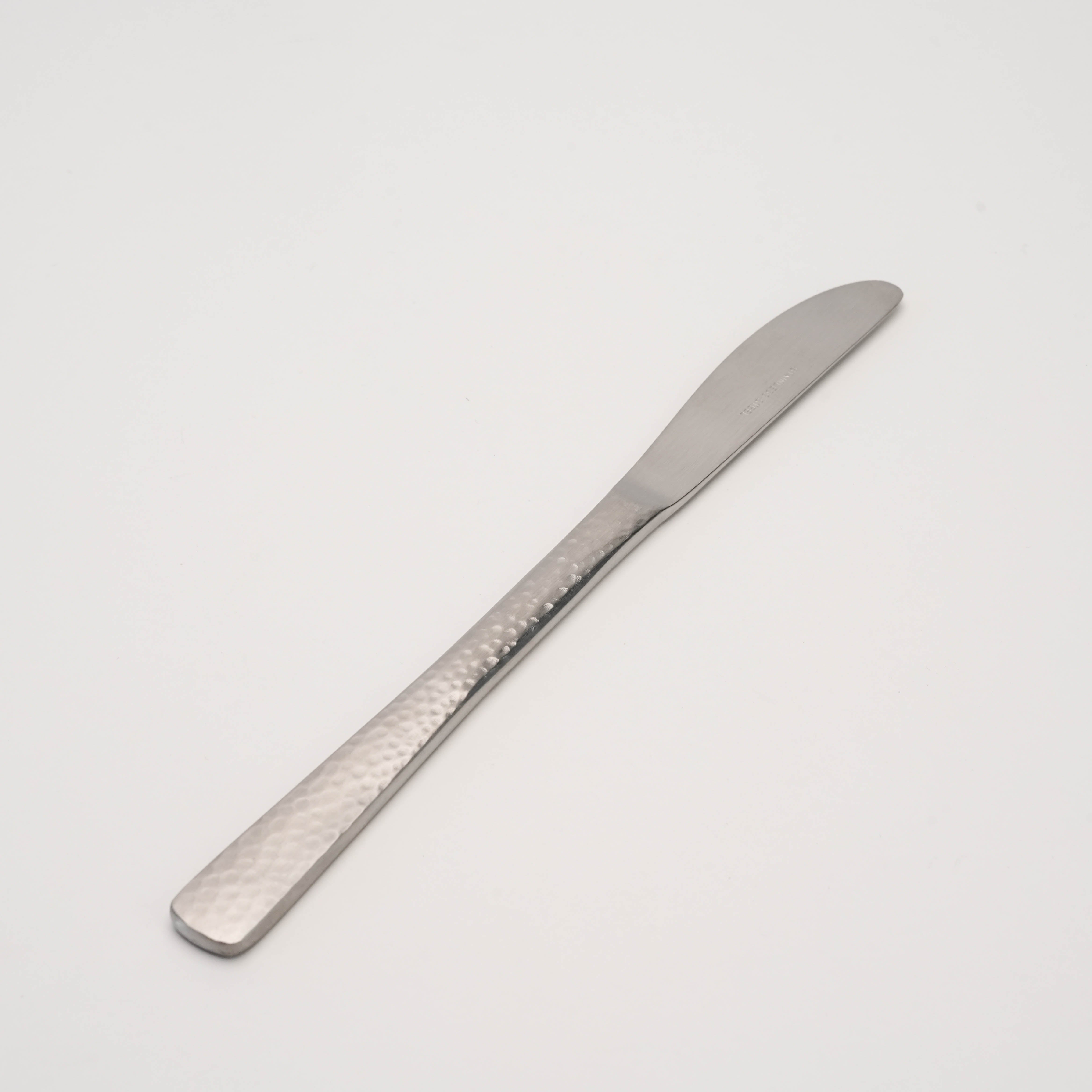 Tsubamesanjo Nagomi Wafu Knife-Hammered with stainless handle, showcasing elegant hammered texture and sleek Japanese craftsmanship.