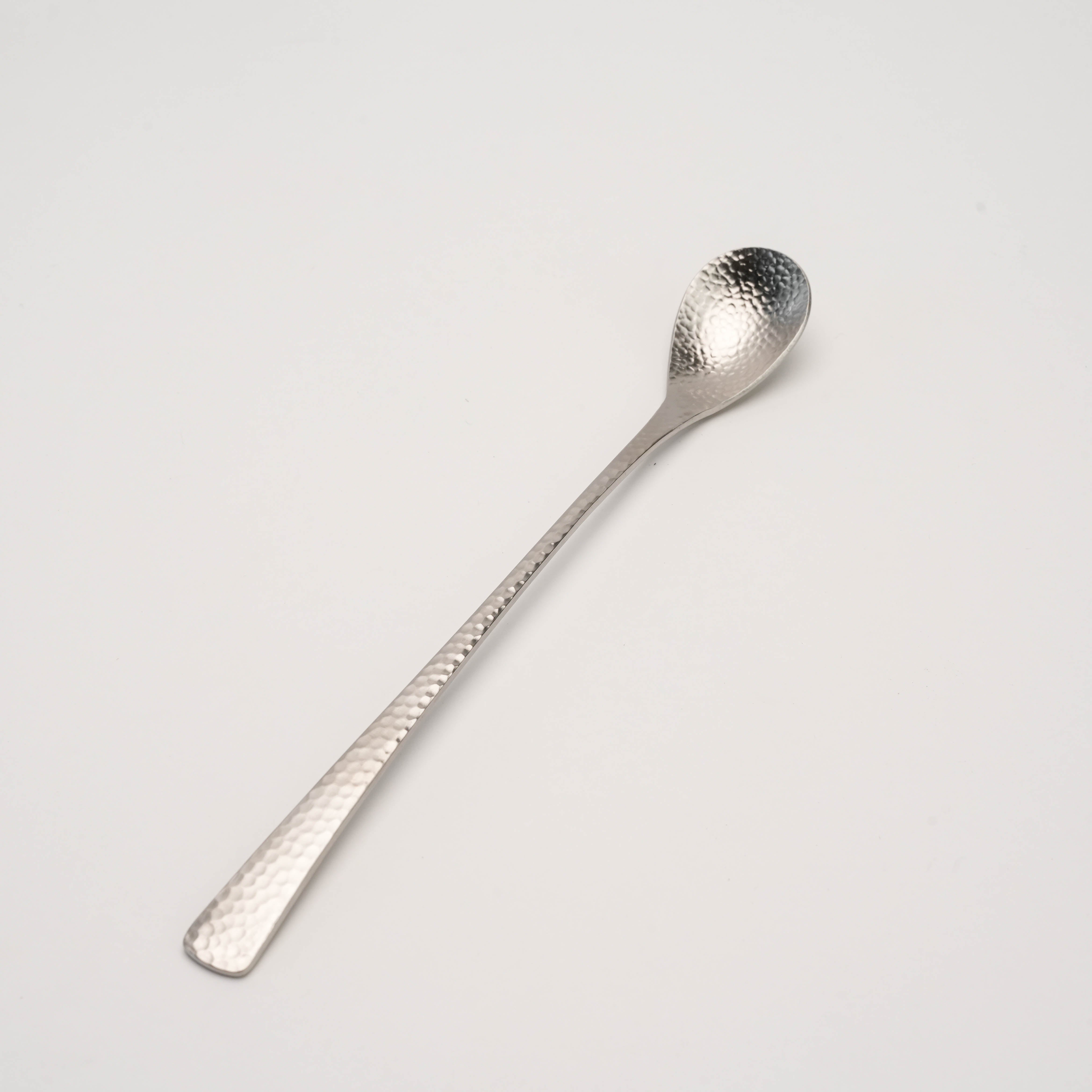 Nagomi Stainless Drink Stirrer with hammered finish, crafted in Japan, ideal for mixing cocktails in elegant barware settings.
