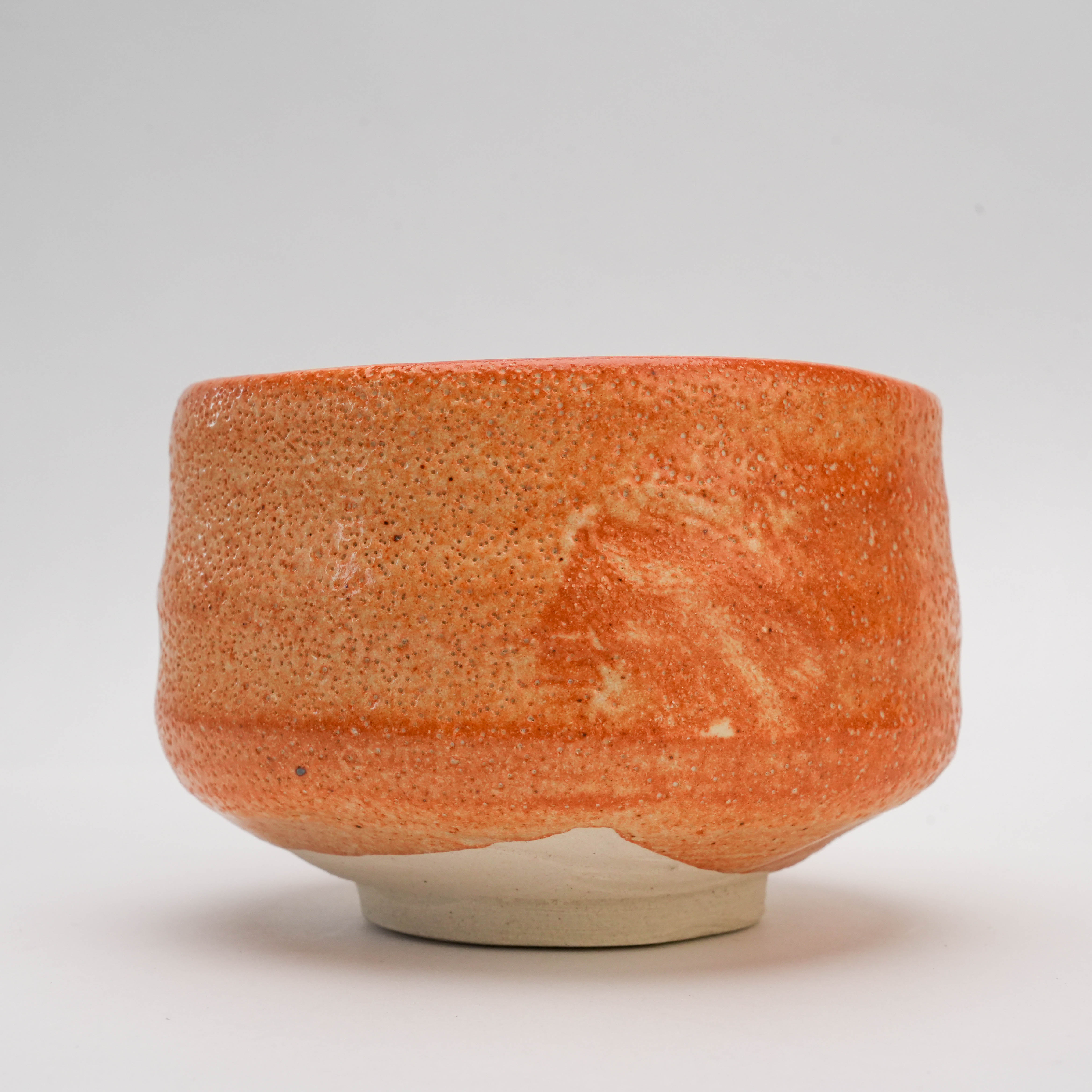 Close-up of Mino Ware Persimmon Glaze Matcha Bowl showing handcrafted texture and warm glaze, ideal for mindful tea rituals and matcha preparation.
