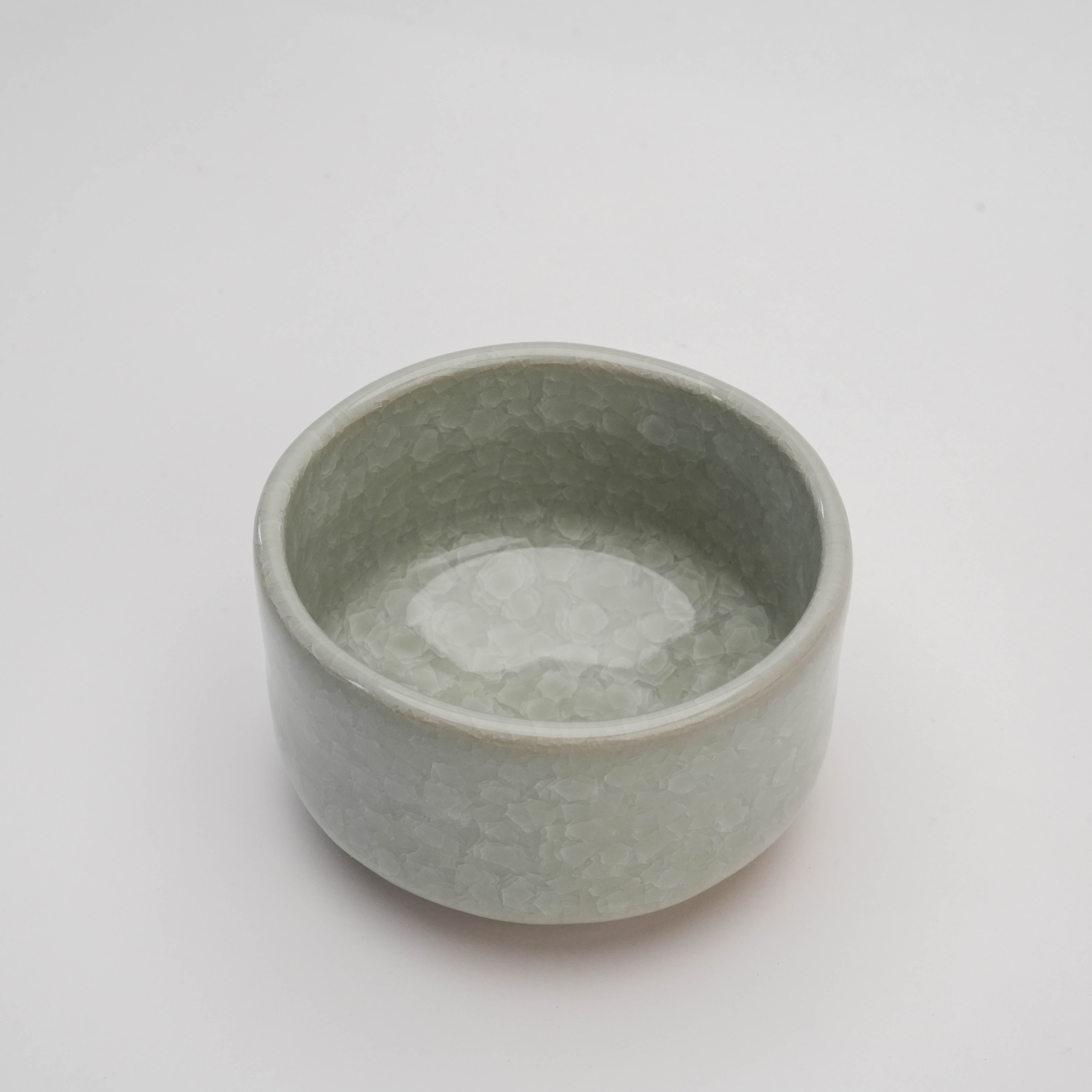 Top view of Mino Ware White Kan-iri Matcha Bowl showcasing its crystalline ice crack pattern and smooth interior for matcha preparation.