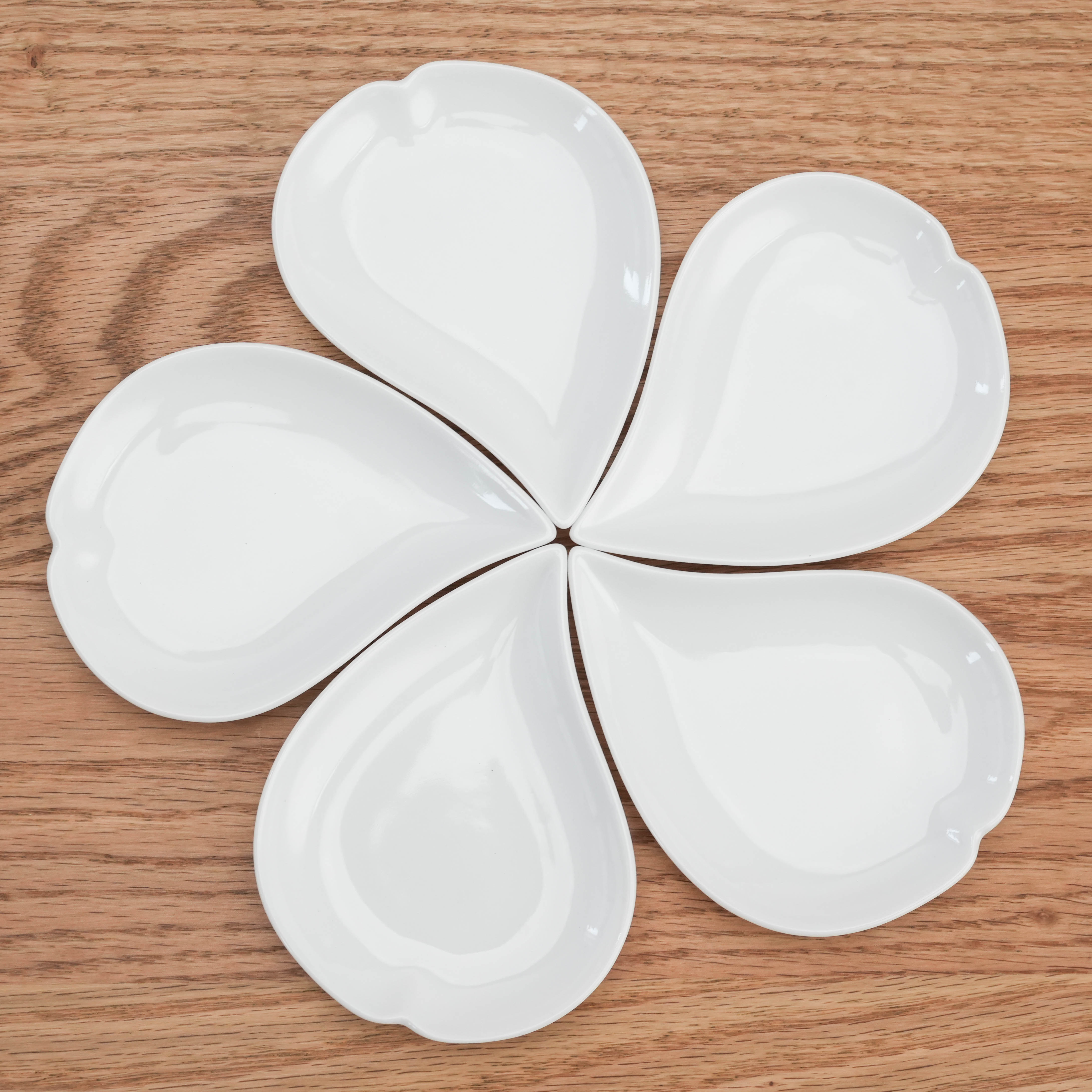 Sakura Plate Set - Mino Ware Petal arranged in a cherry blossom shape on wood surface, ideal for elegant small dish presentation.