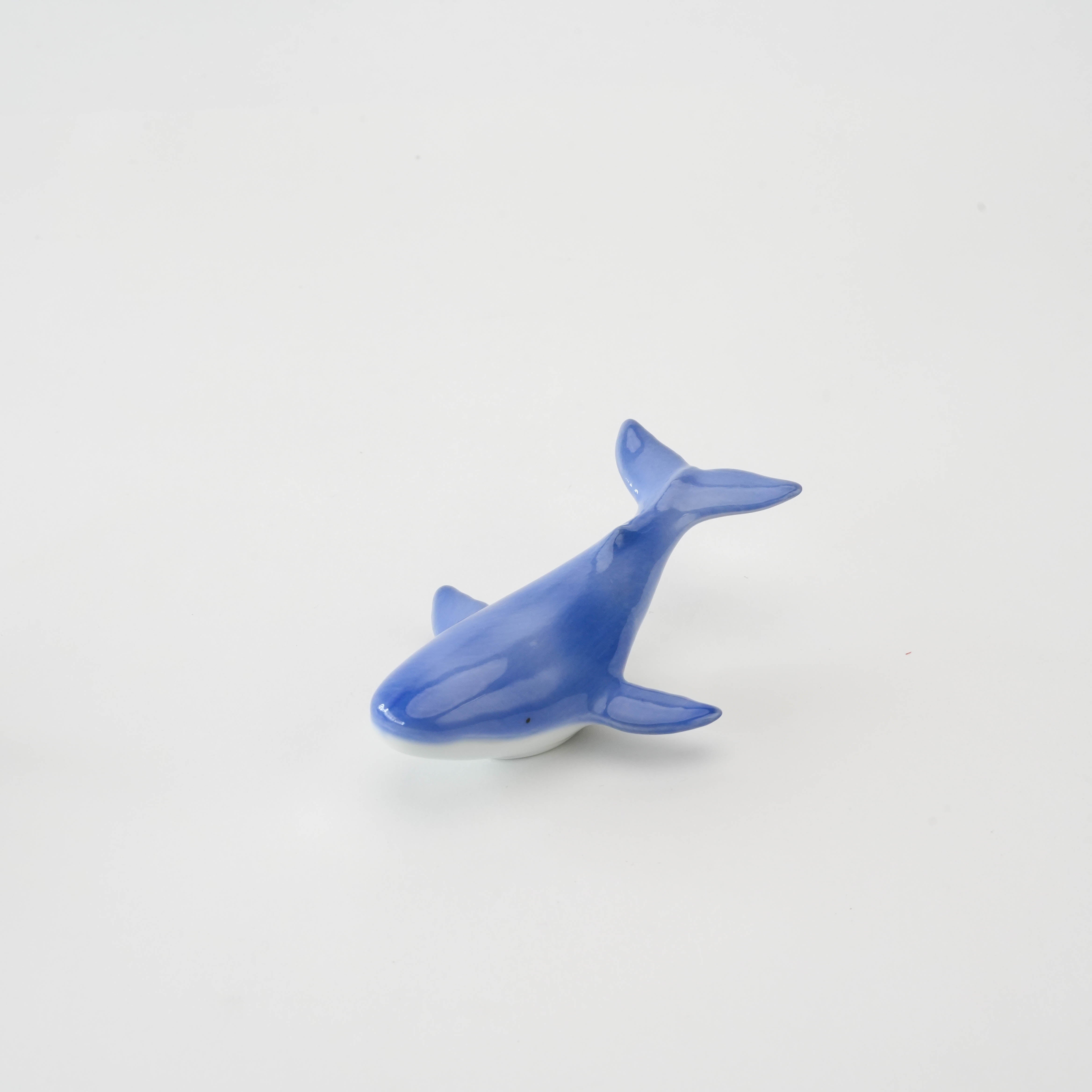Arita Ware Whale Chopstick Rest in ocean-blue porcelain shaped like a humpback whale, ideal for elegant table settings.