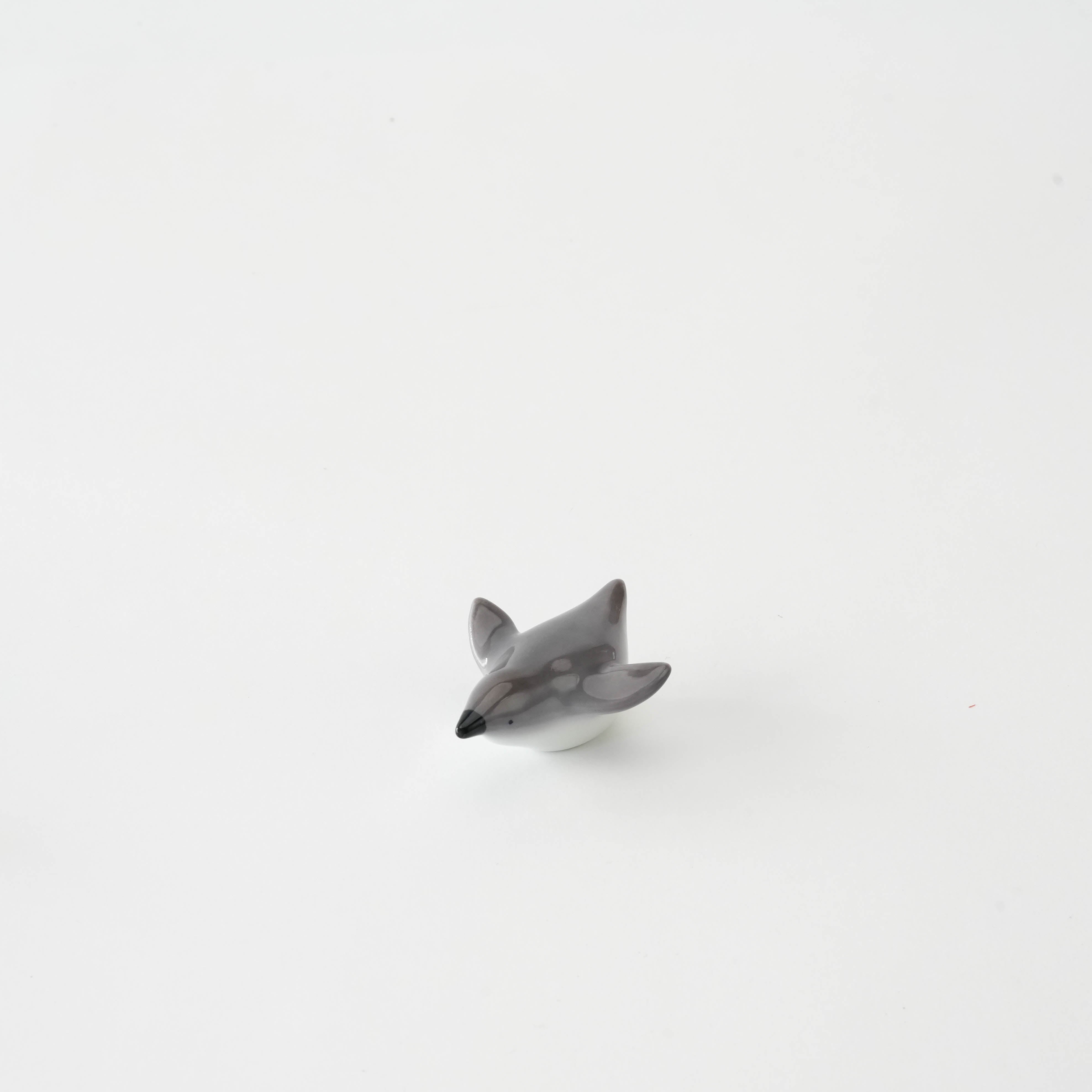 Penguin Chopstick Rest - Arita Ware handcrafted ceramic holder shaped like a penguin, ideal for elegant Japanese table settings.