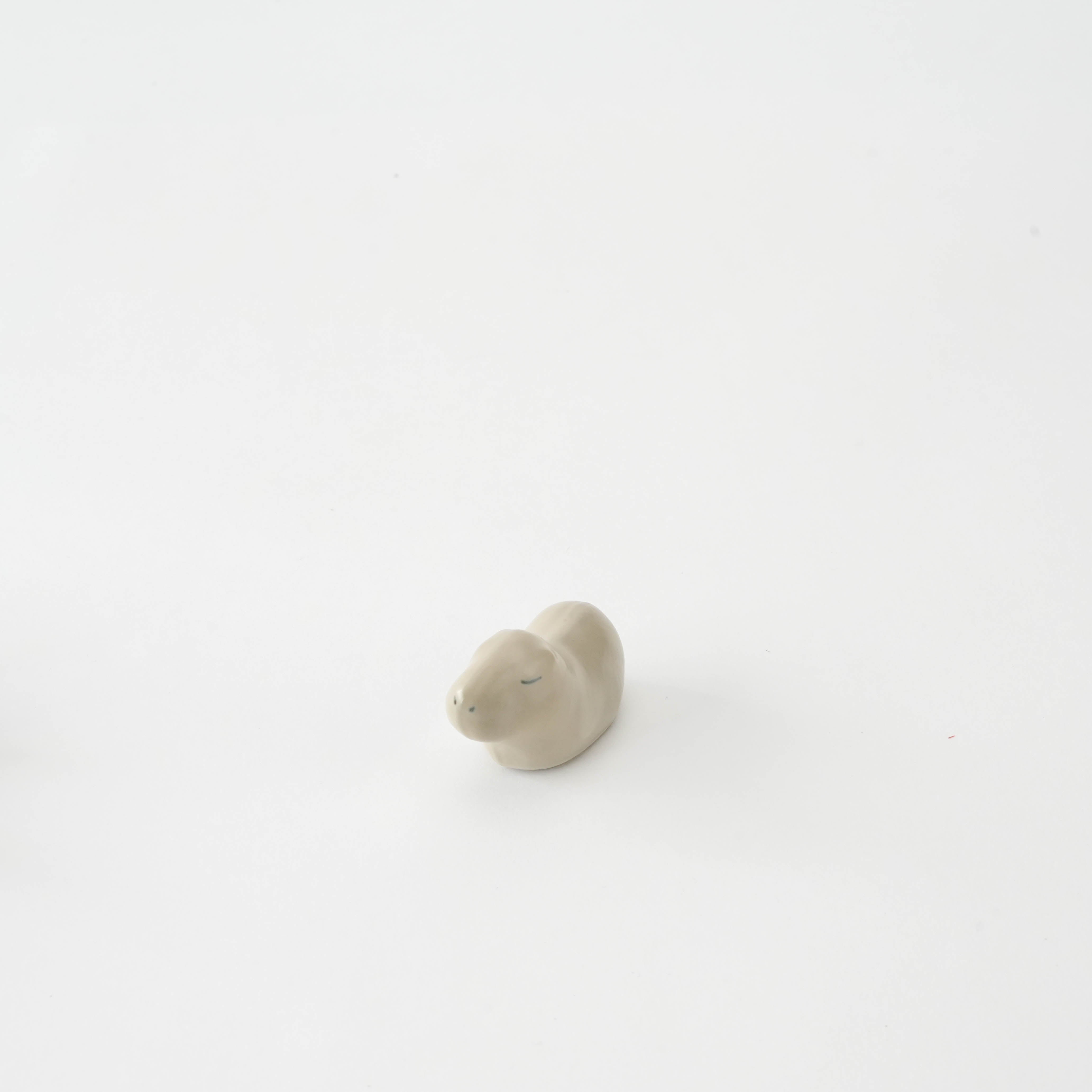 Capybara Chopstick Rest - Craftsmanship Gift | Arita Ware, handcrafted ceramic holder shaped like a serene capybara, ideal for table decor.