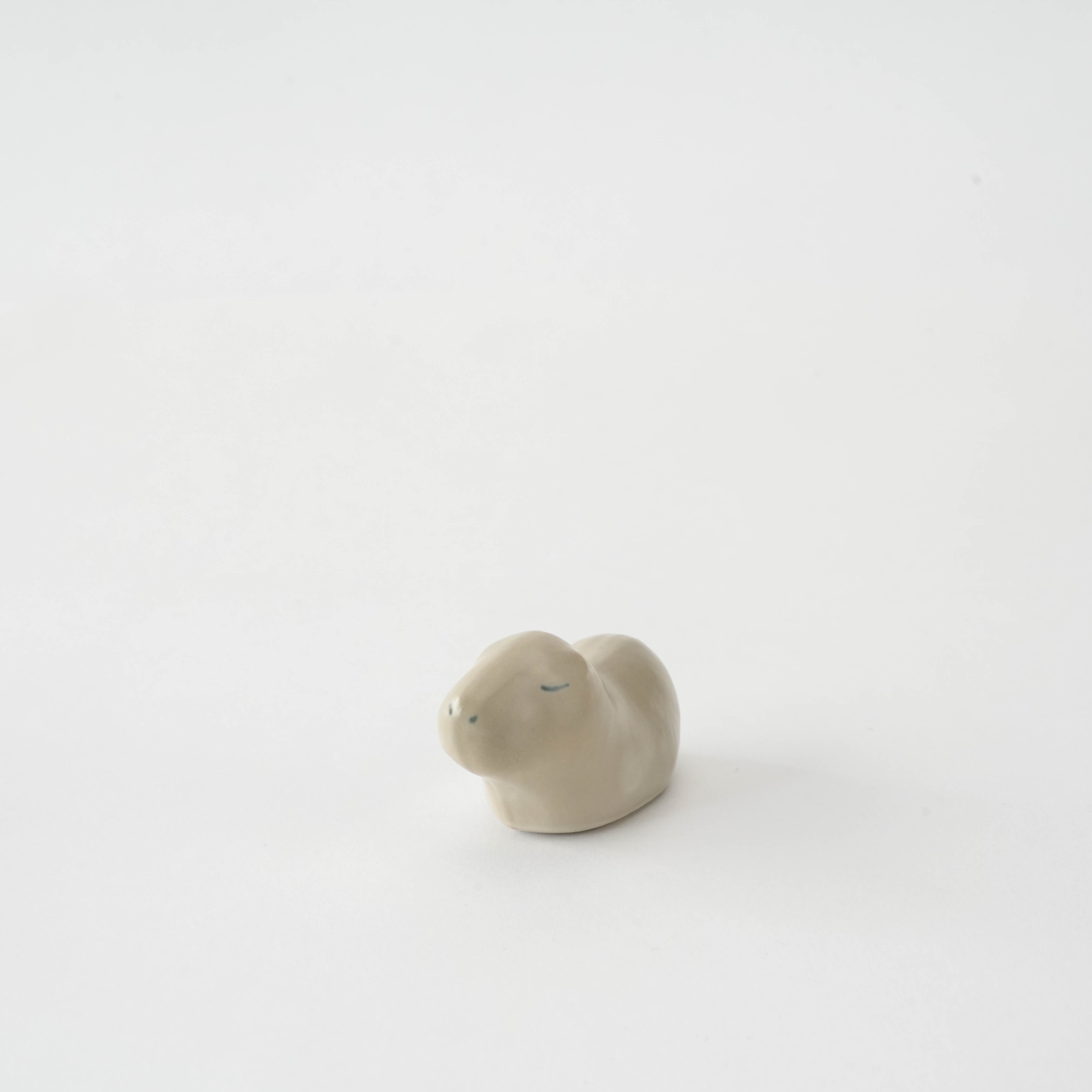 Arita Ware Capybara Chopstick Rest in beige ceramic, a cute and calming addition to any dining setup, perfect for gifting or collecting.
