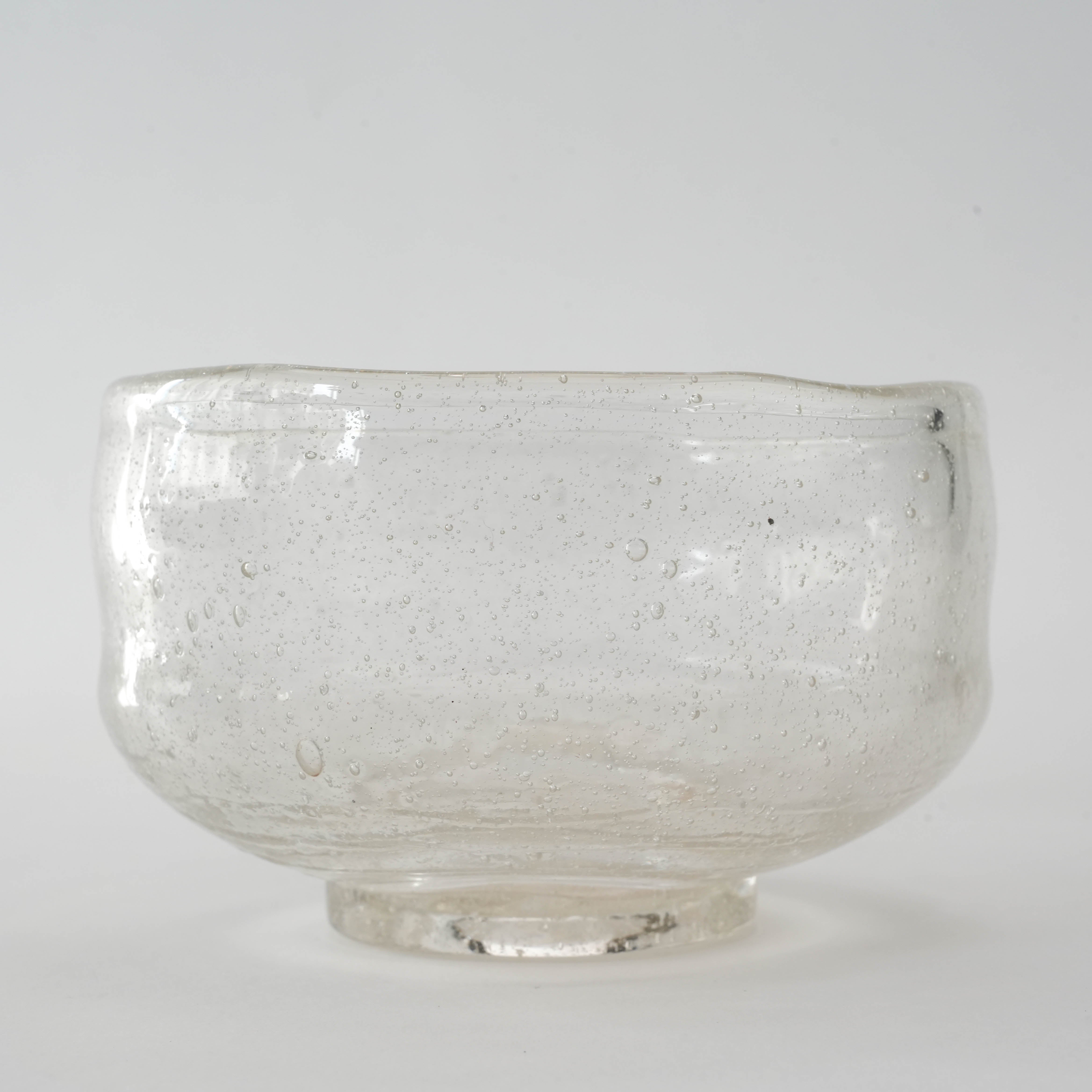 Close-up of Blown Glass Matcha Bowl showcasing hand-blown craftsmanship and unique imperfections for a rustic tea experience.