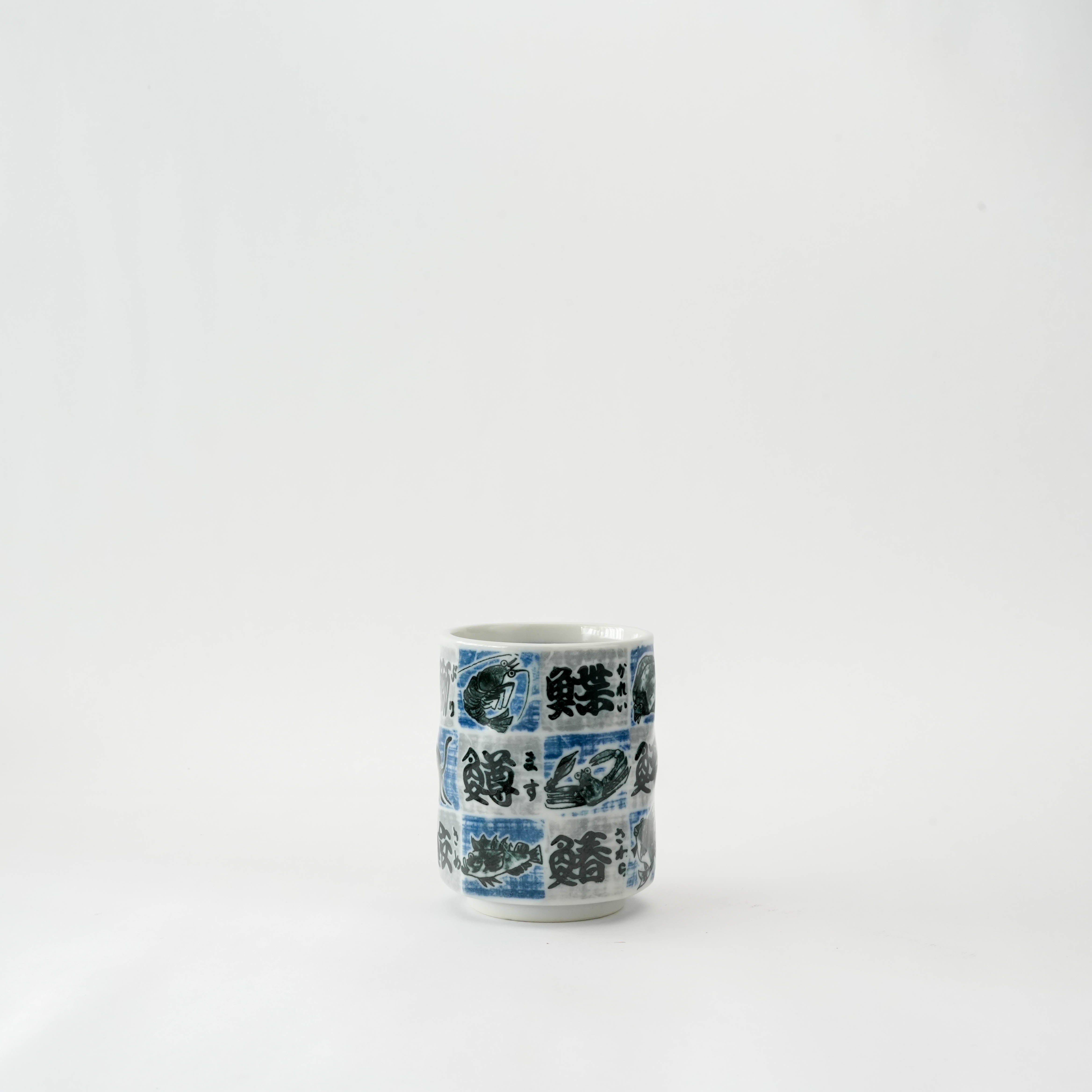 Tsubame Fish Tea Cup with 320ml capacity featuring blue and white twisted checkered design and Japanese fish motifs, perfect for tea lovers.