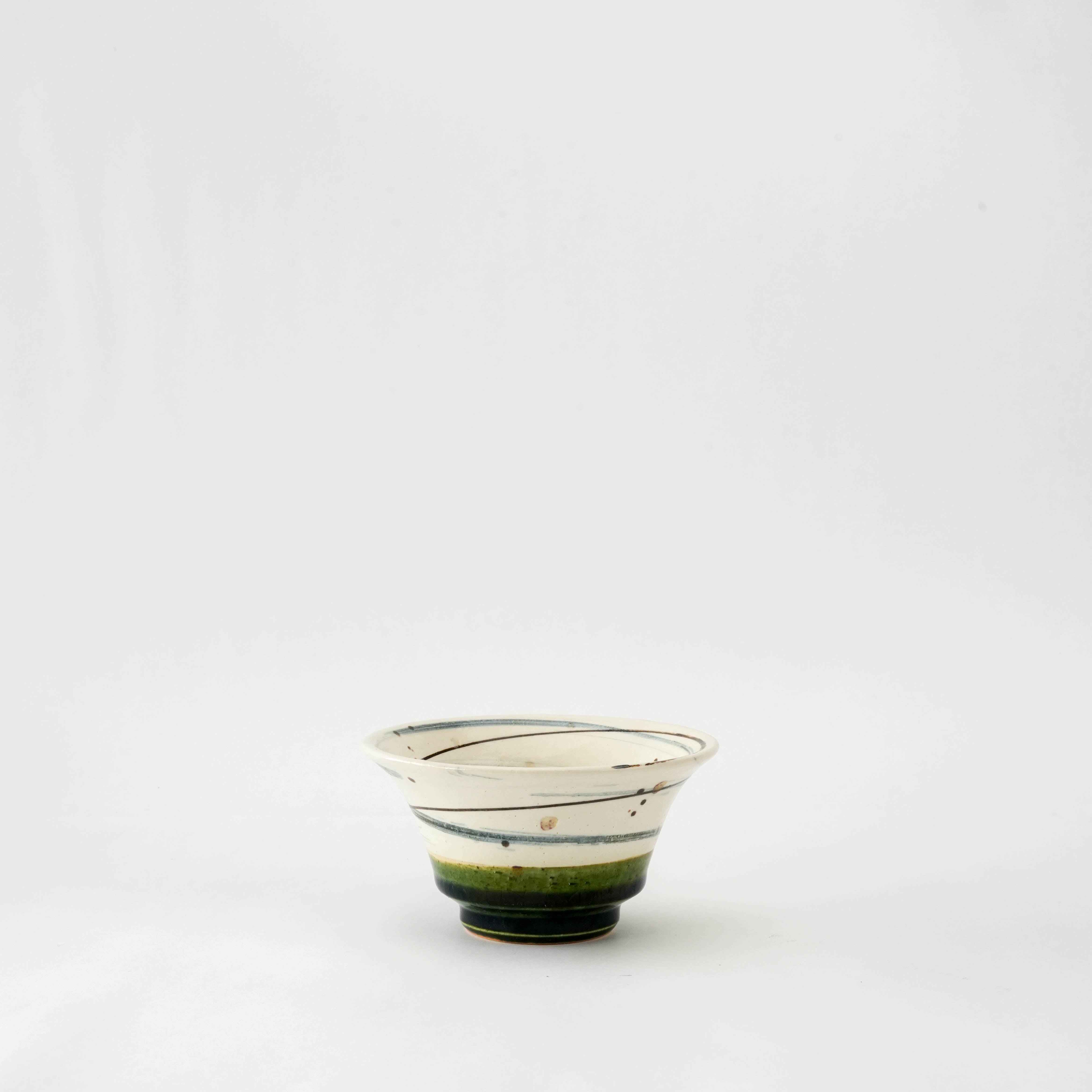 Mino Ware Oribe Small Bowl with hand-painted spiral design and Oribe green glaze, ideal for rice or side dishes in Japanese tableware.