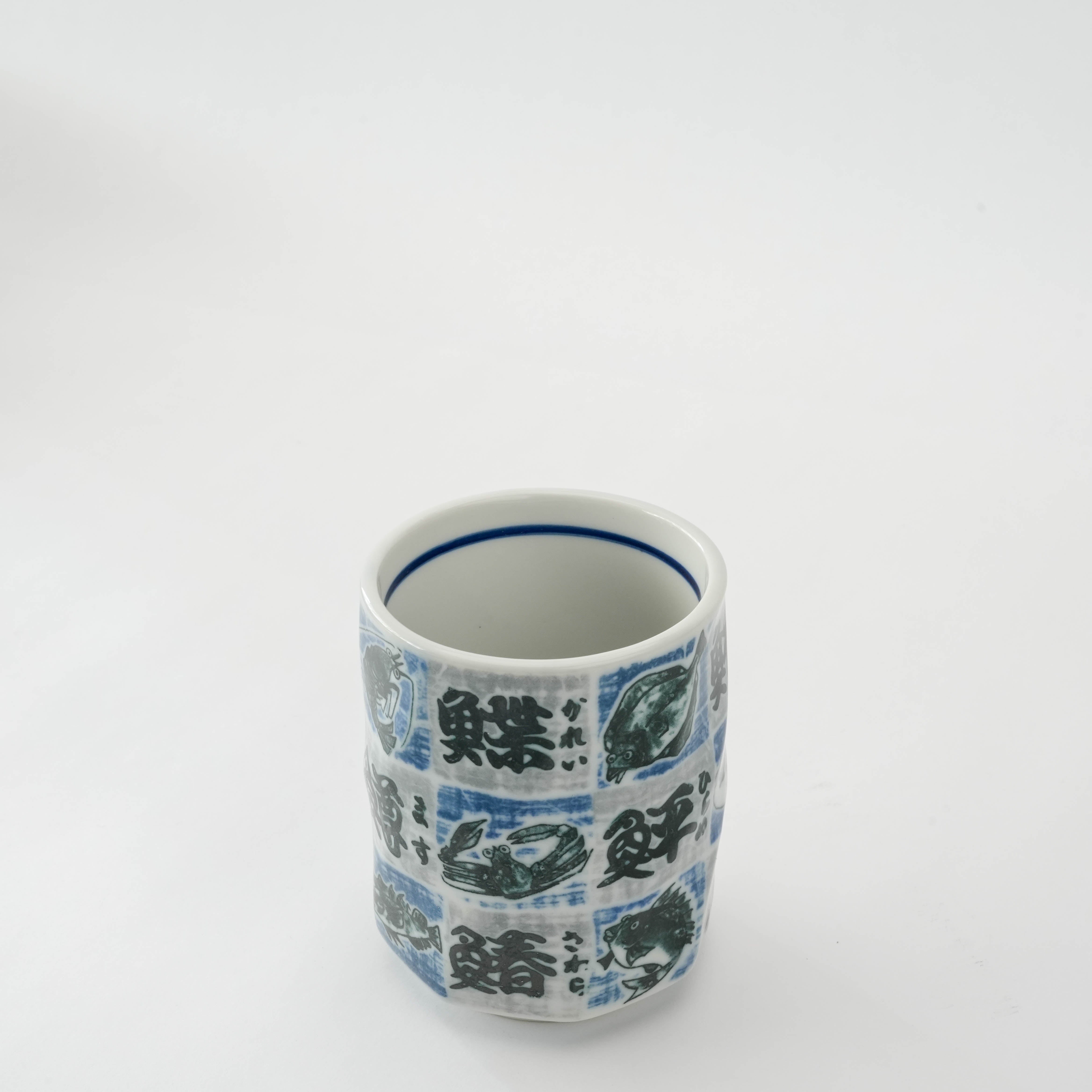 320ml Tsubame Fish Tea Cup showcasing a unique ichimatsu pattern with detailed fish illustrations, ideal for Japanese-style tea service.