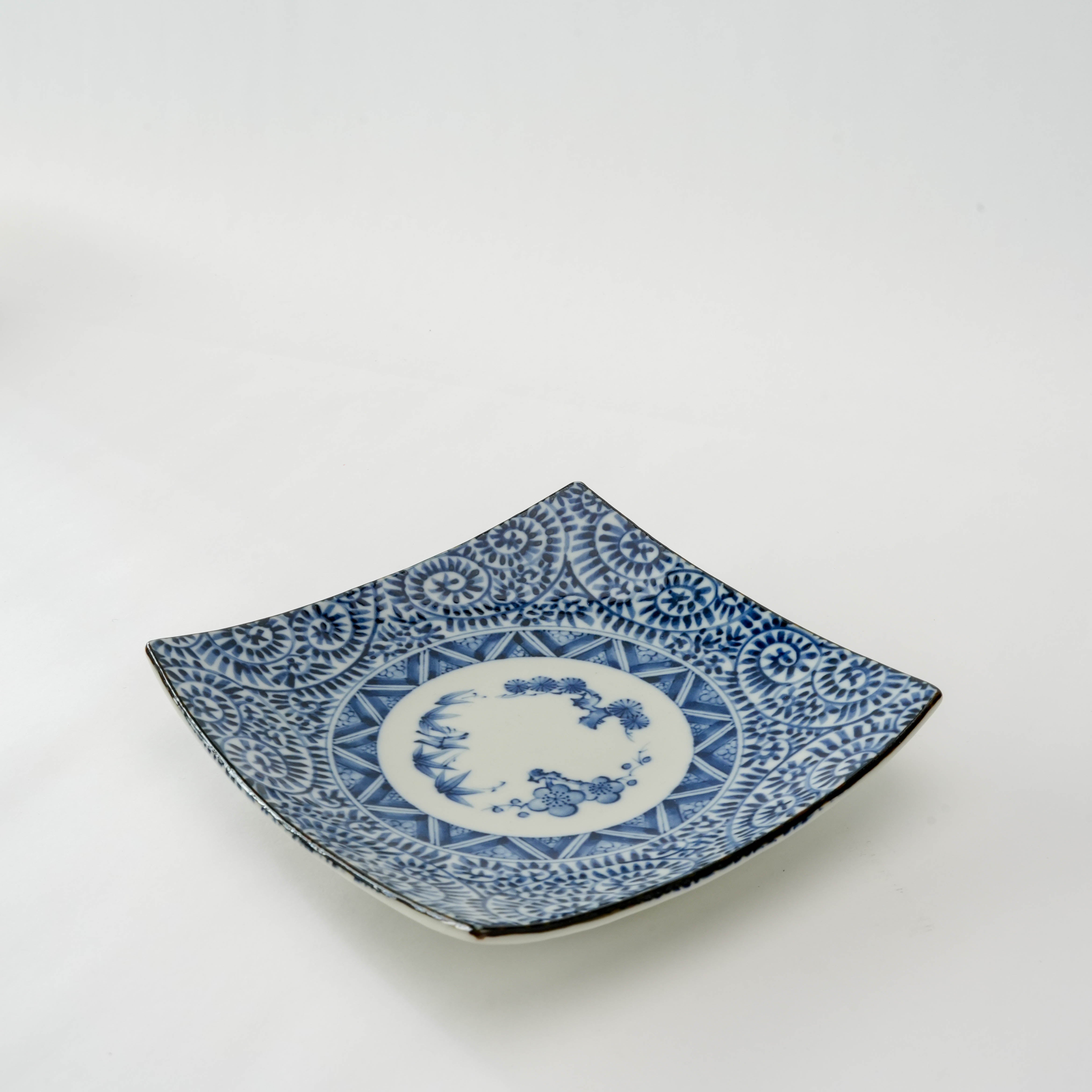 Traditional Mino Ware Tako Karakusa Square Plate featuring intricate blue indigo motifs, perfect for serving sashimi or appetizers.