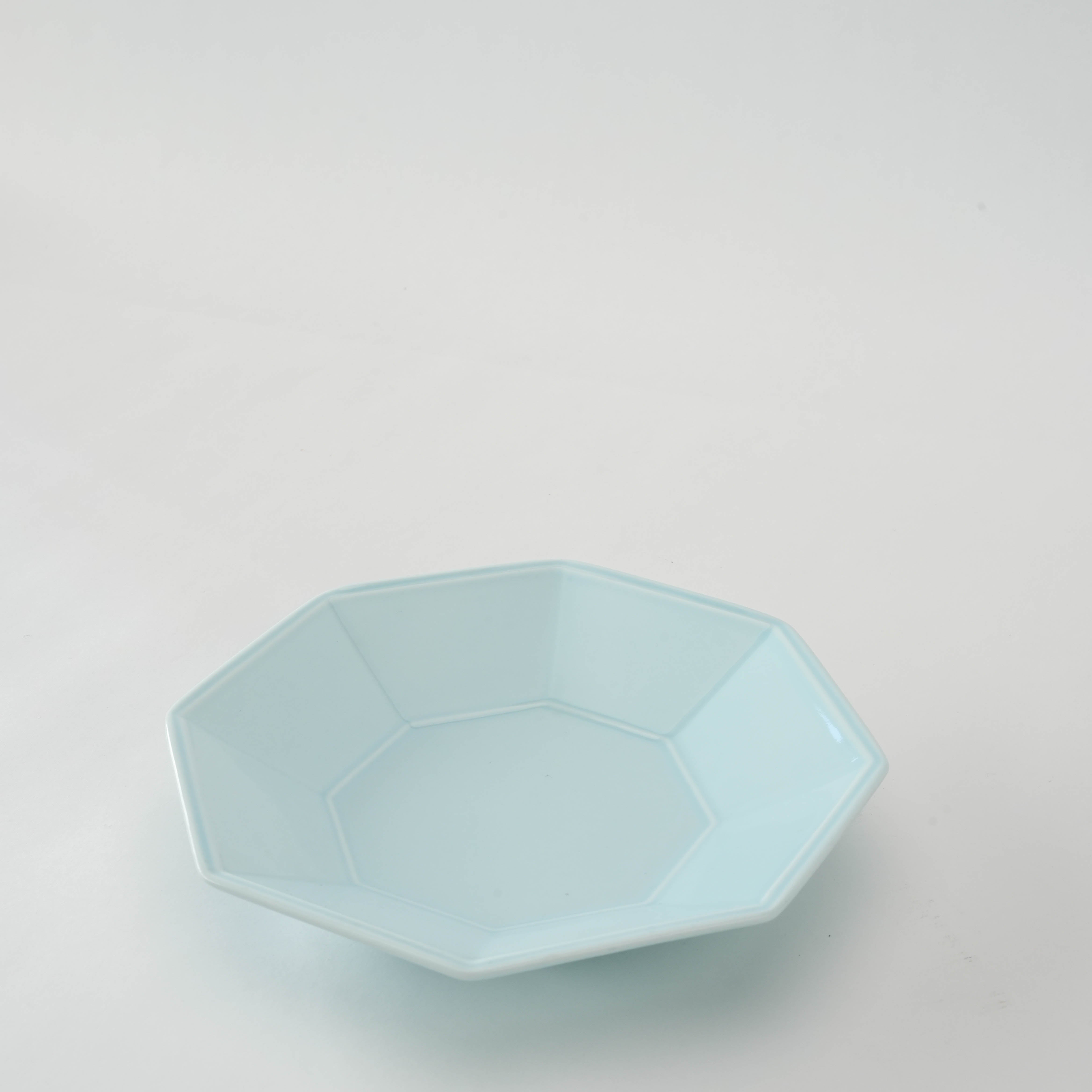 Elegant Mino Ware Celadon Octagonal Plate with a glossy finish, ideal for serving appetizers or desserts.