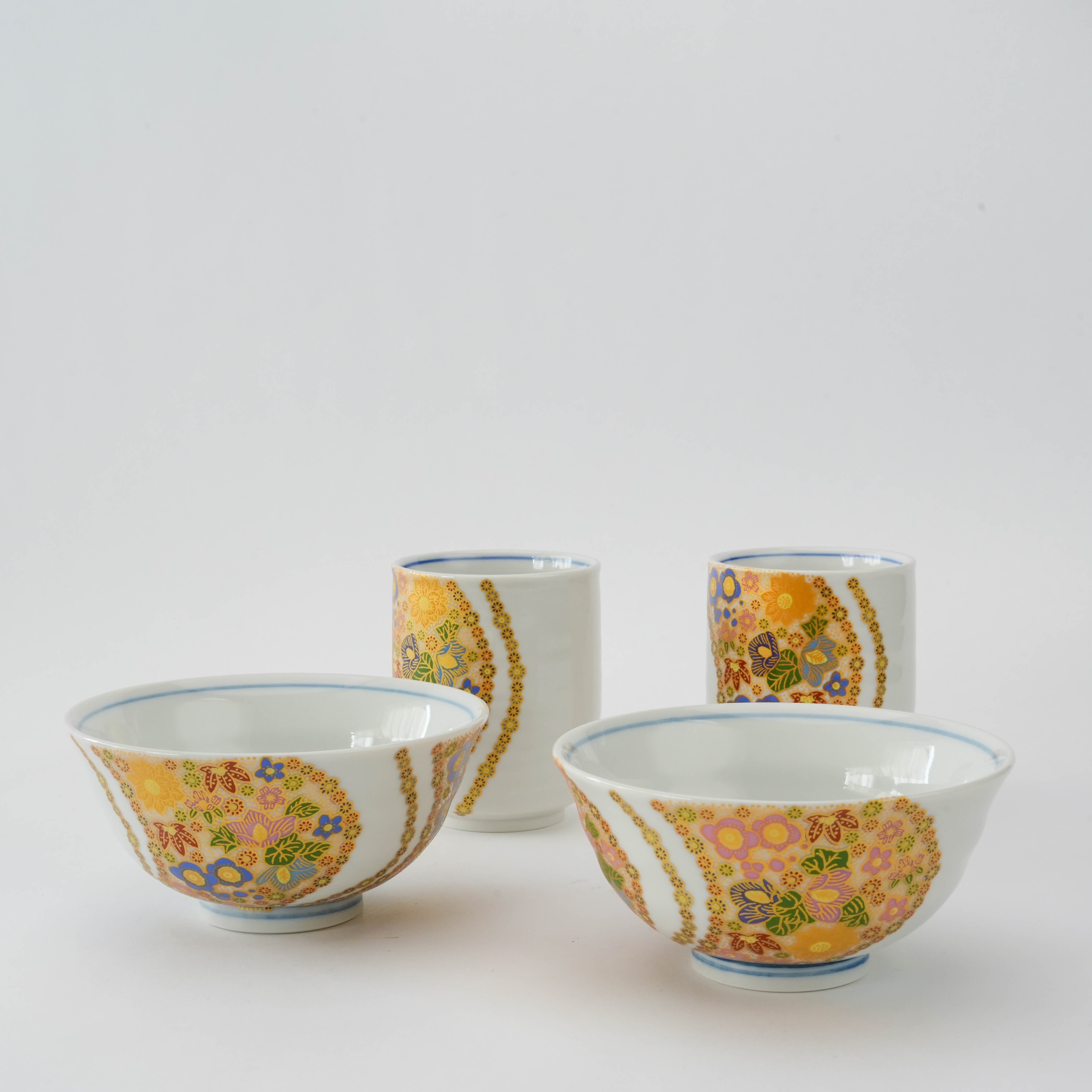 Kutani Ware Dinner Set - Flower Design featuring two bowls and two cups with intricate Hanazume floral patterns and gold detailing, perfect for elegant dining.