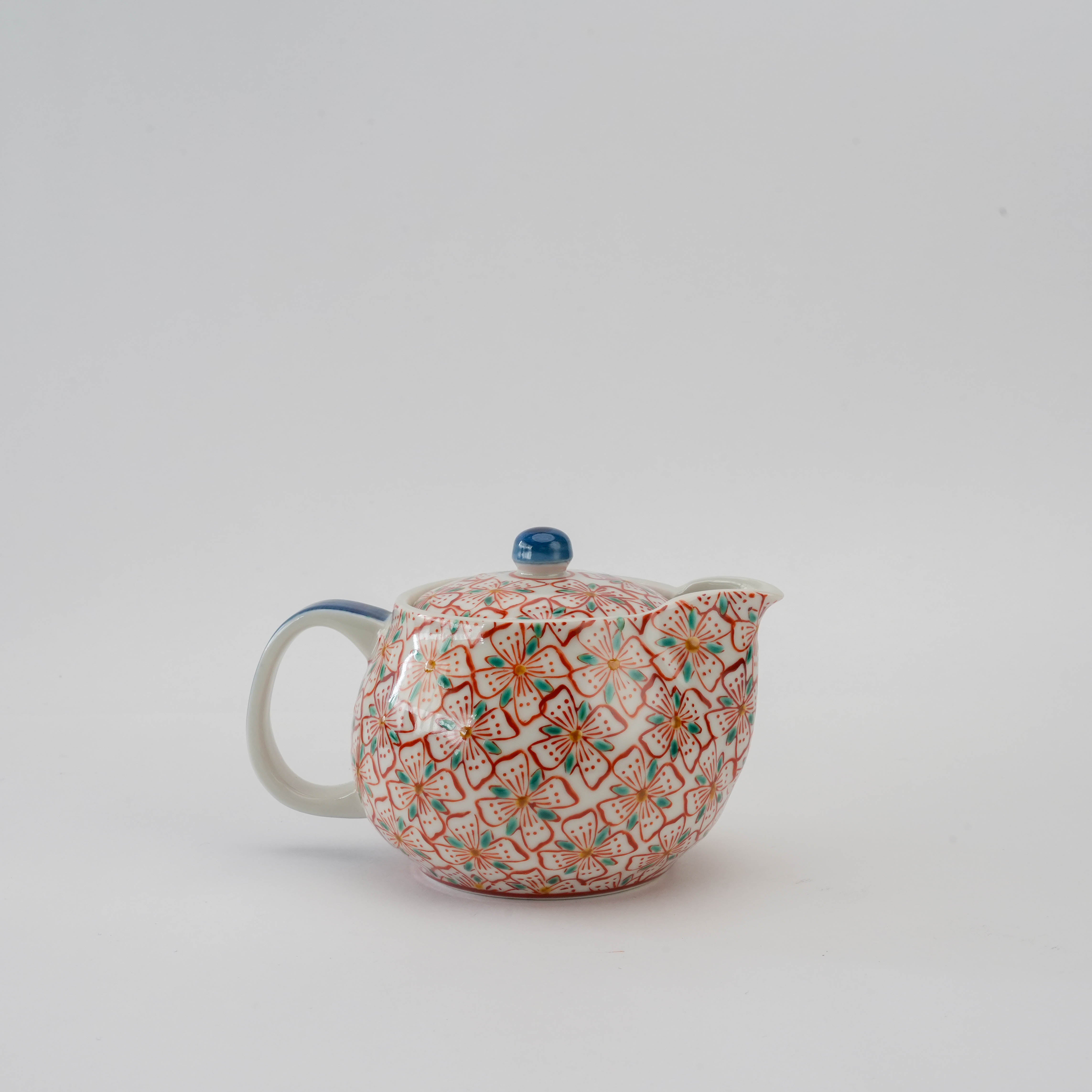 Side view of Kutani Ware Teapot - Red Blossom showing intricate hand-painted blossoms and curved spout, ideal for elegant tea service.