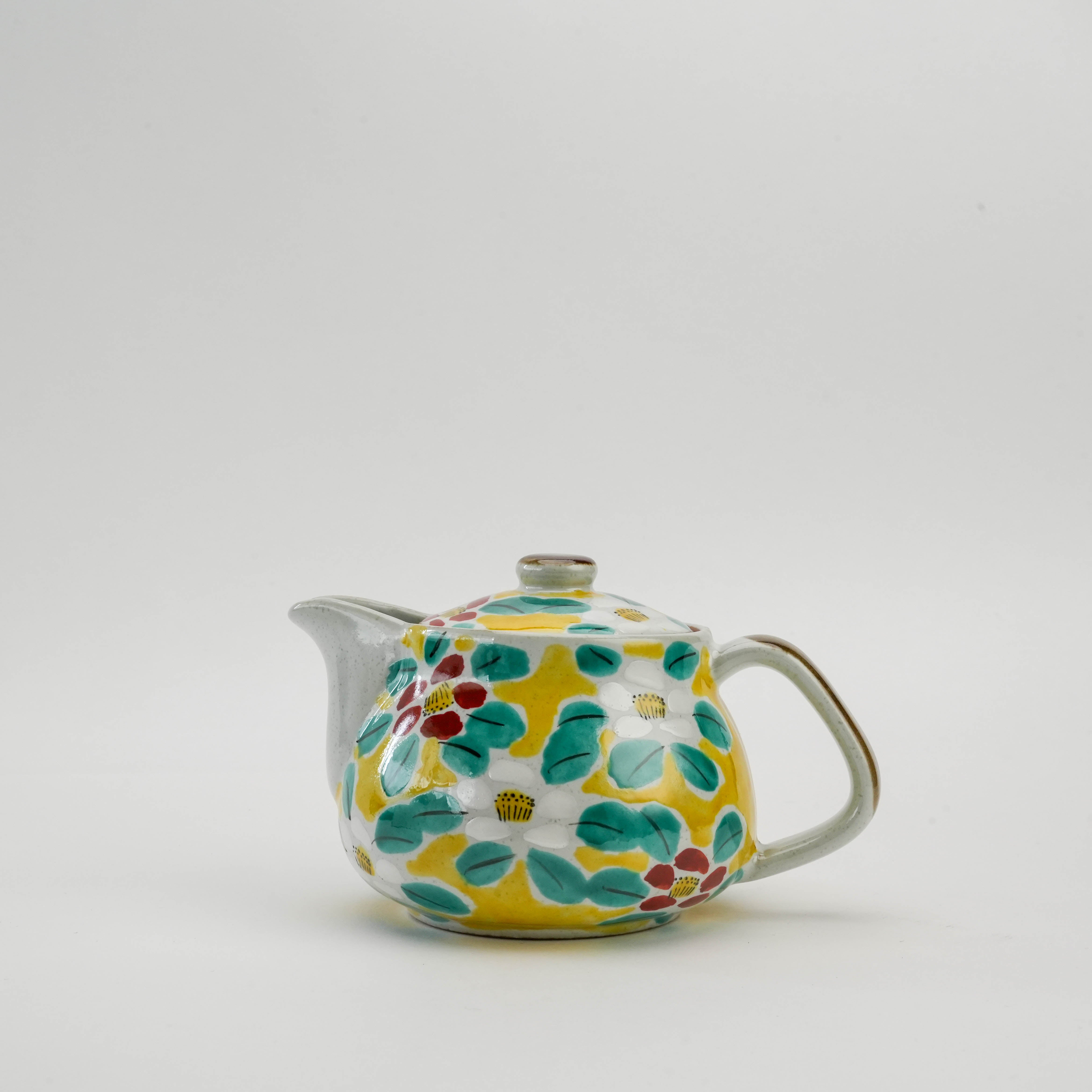 Kutani Ware Teapot - Yellow Blossom with hand-painted floral design in red, white, and green on a yellow background. 360ml ceramic teapot with curved spout.