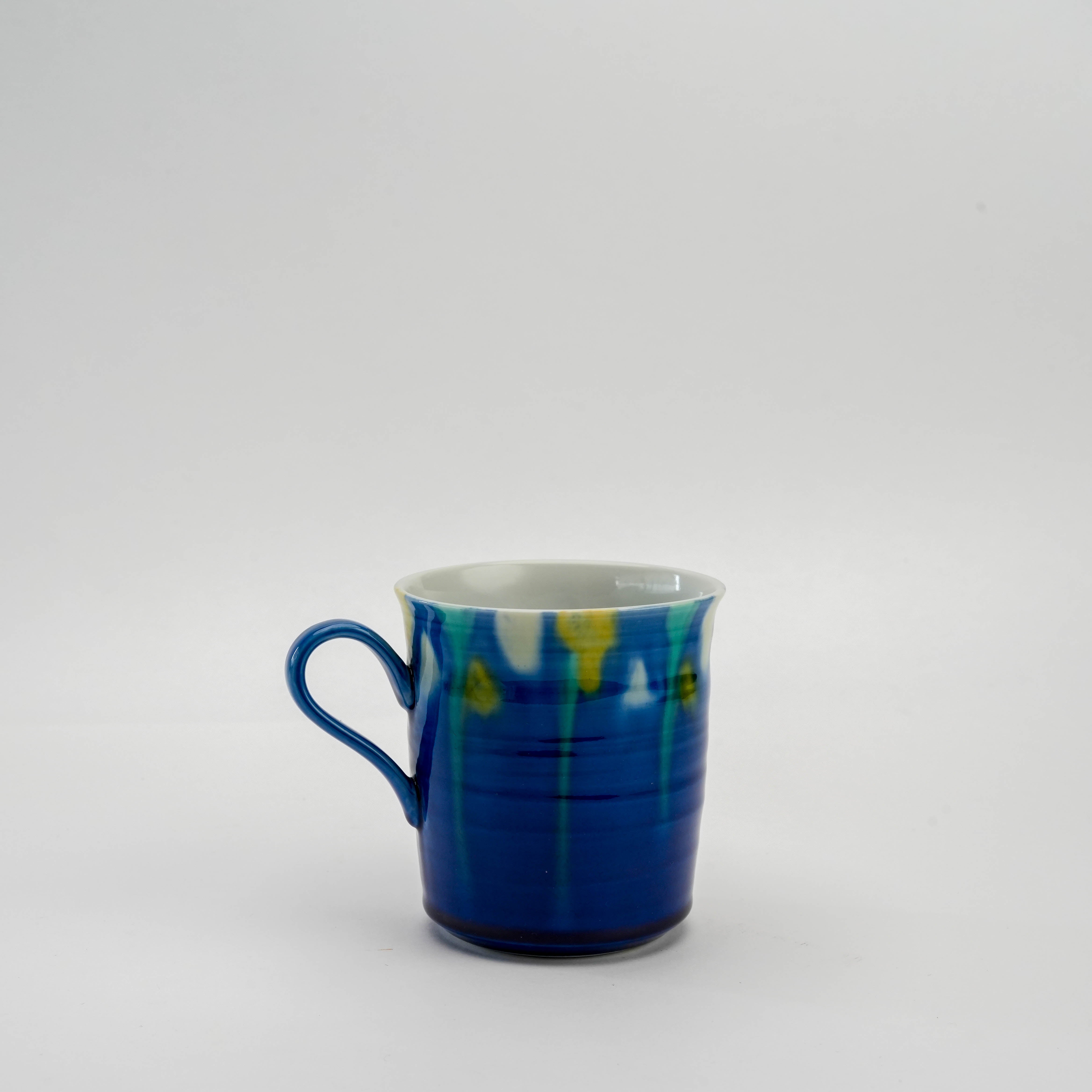 Side view of Kutani Mug featuring cobalt blue gradient glaze and artistic detailing, ideal for kitchen and dining collections.