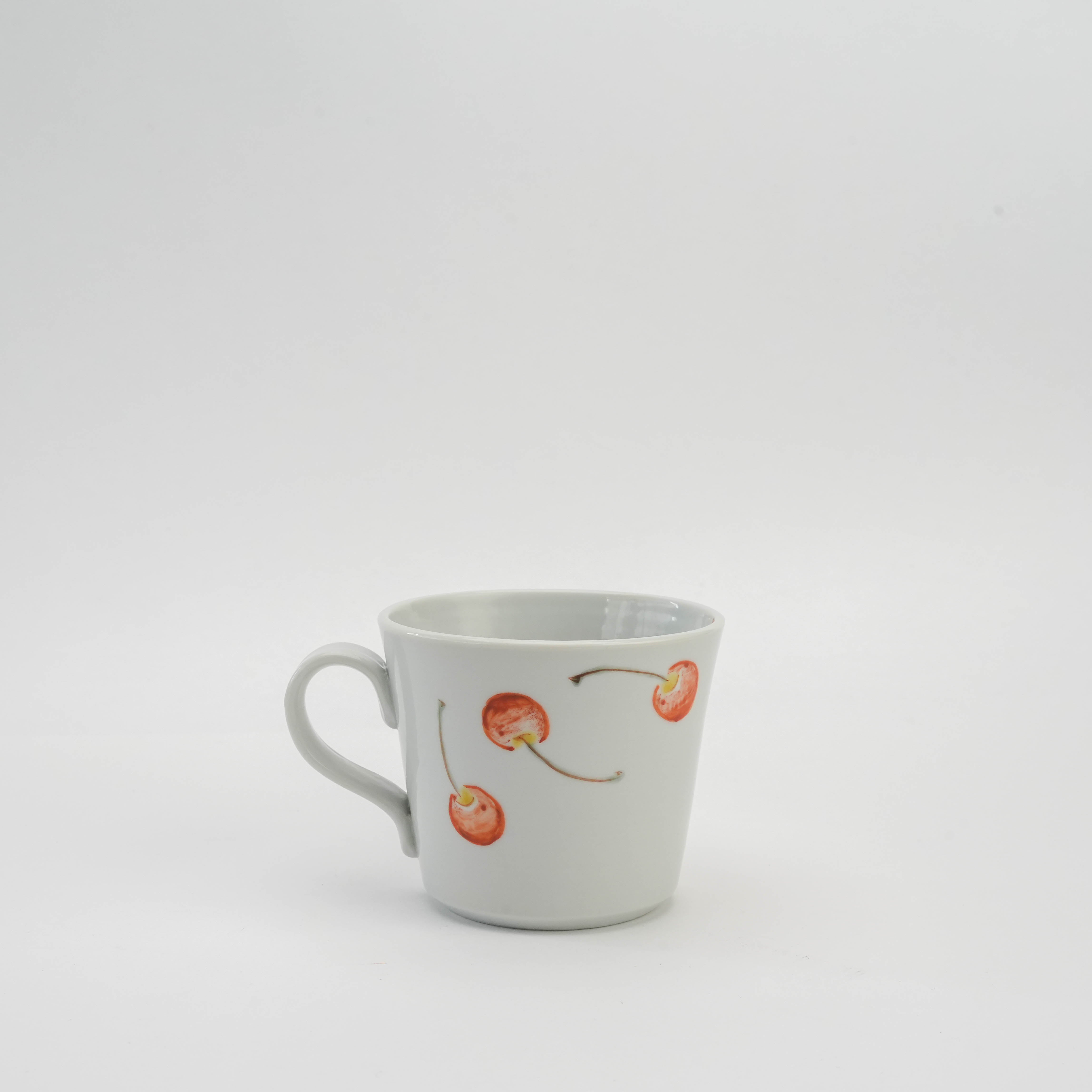 Porcelain Kutani Mug featuring hand-painted cherry design, perfect for adding charm to your tableware collection in home and garden decor.