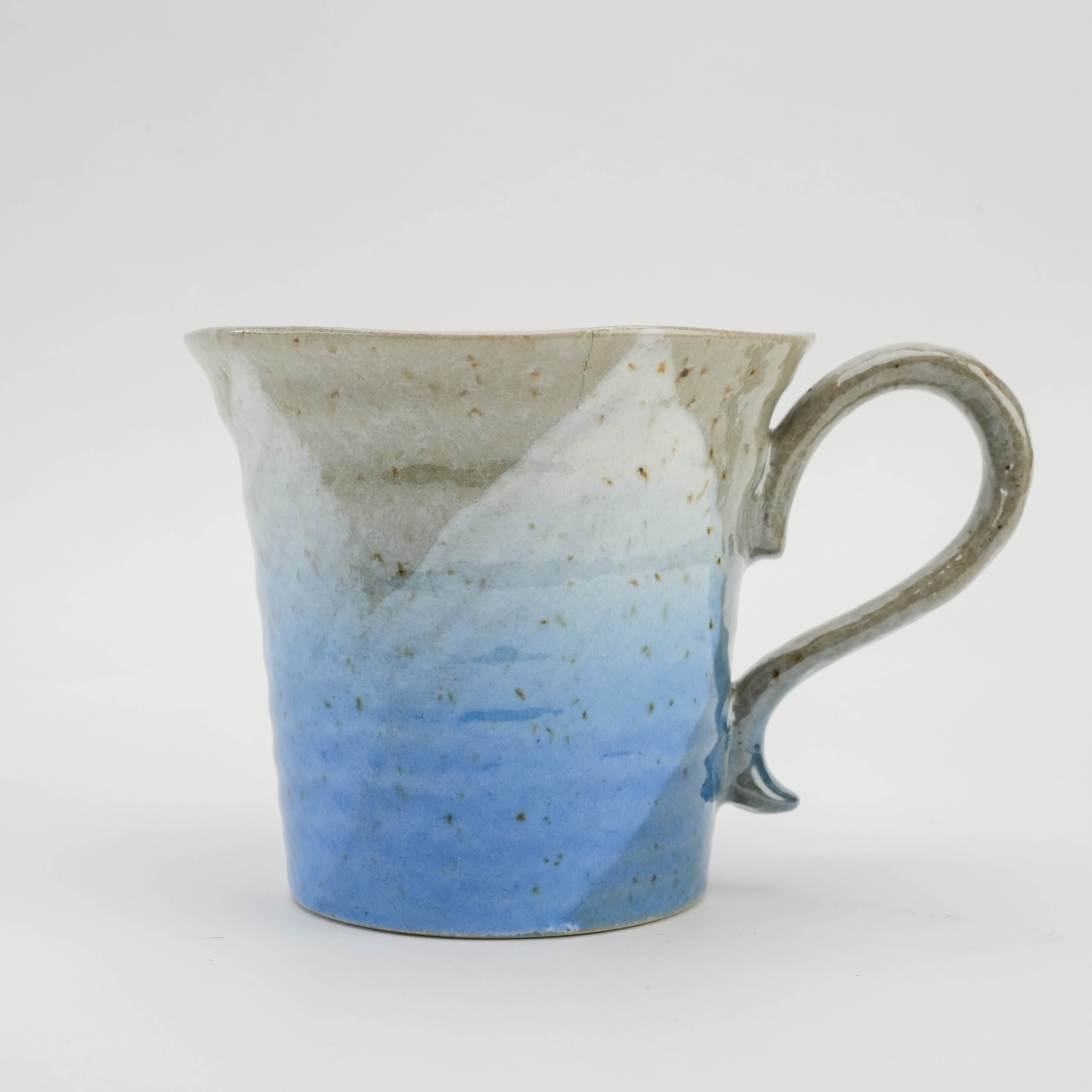 Close-up of ocean blue Kutani Ware Sakura Mug showcasing fine Japanese porcelain craftsmanship and smooth gradient glaze.