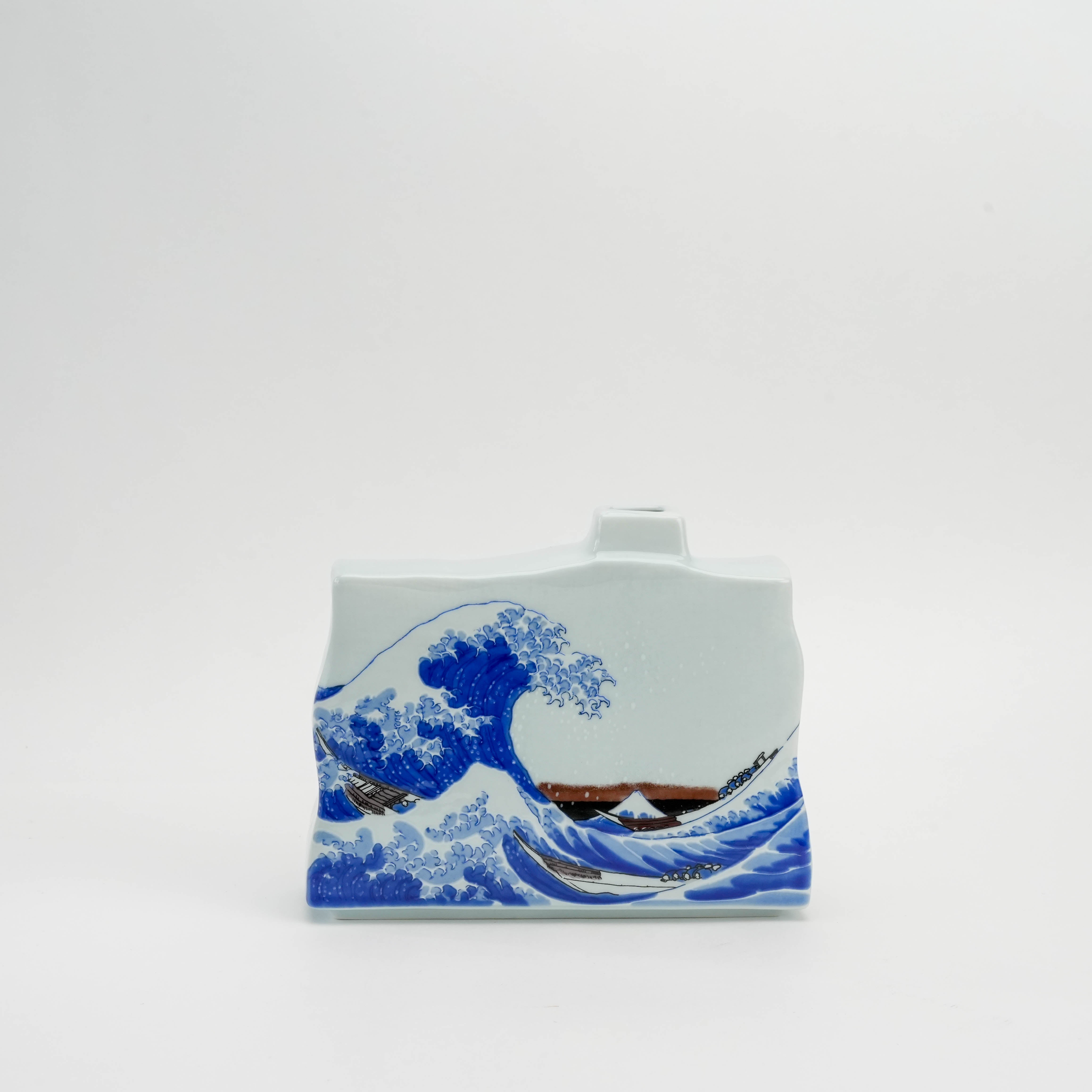 Kutani Ware Ikebana Vase featuring Hokusai’s The Great Wave in vivid blue on porcelain. Ideal for Japanese minimalist floral decor.