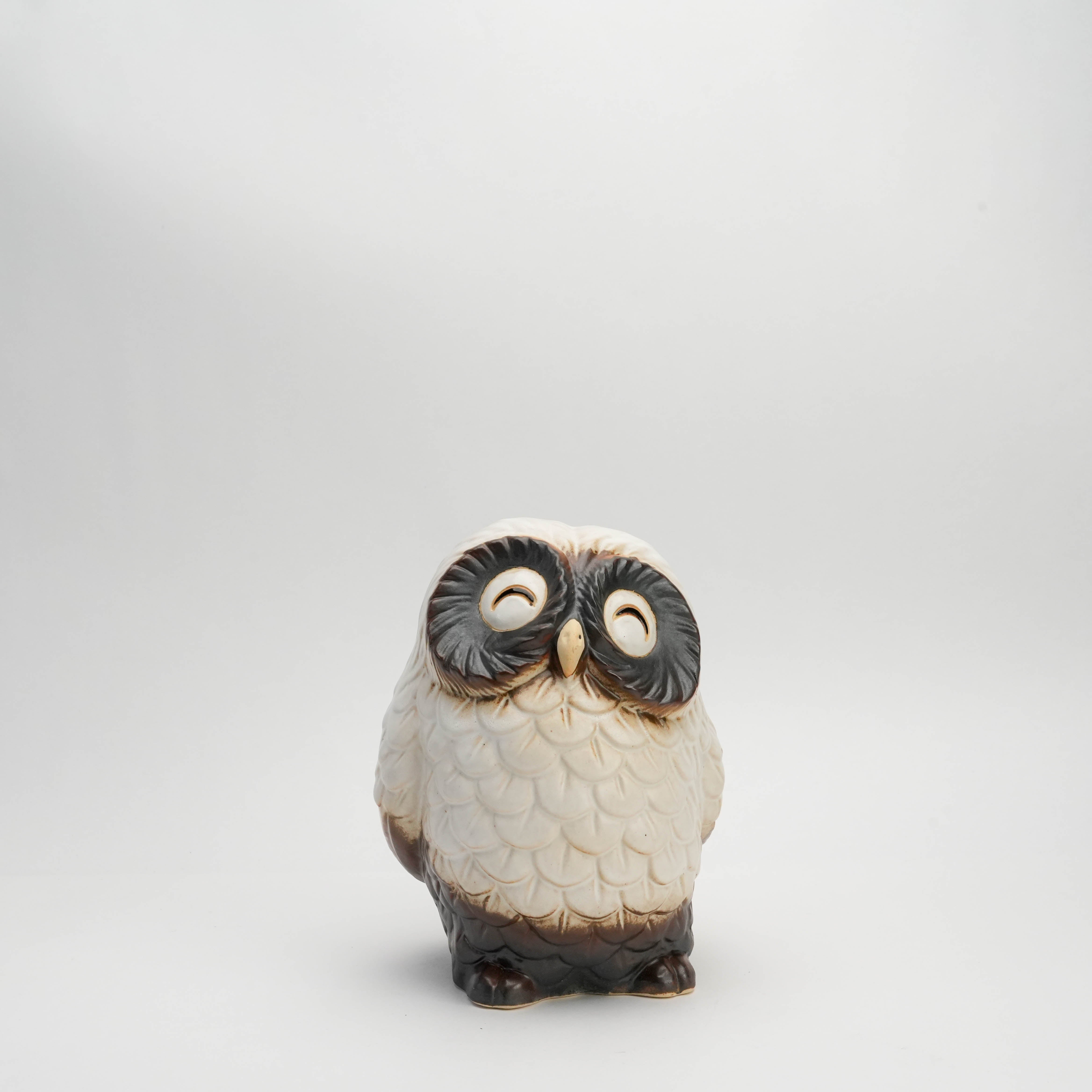 Front view of large White Owl Ornament - Smiling Shigaraki, showcasing its cheerful expression and hand-sculpted ceramic craftsmanship.