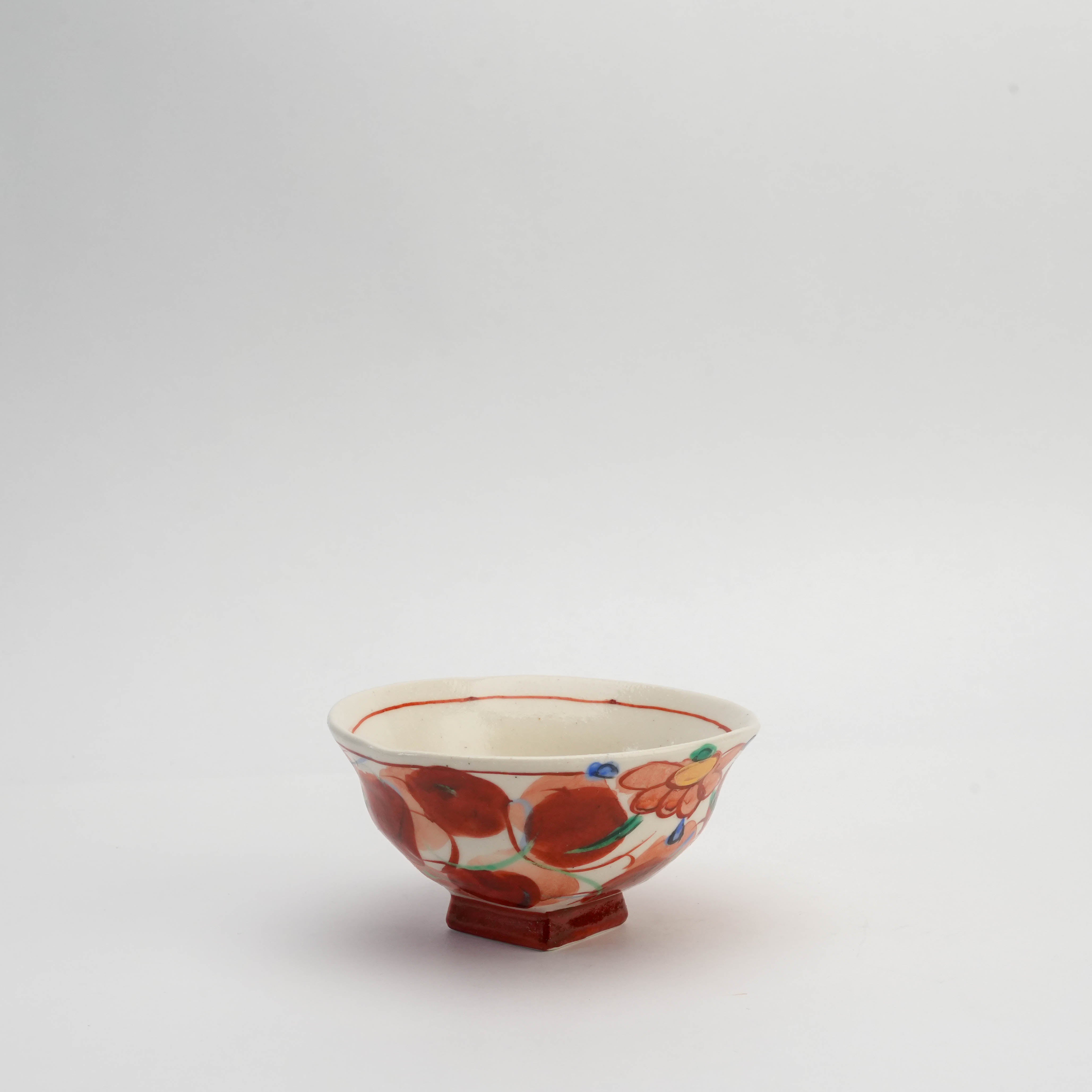 Mino Ware Akae Konoha Rice Bowl with square base, hand-painted in red, green, and blue floral motifs. Japanese bowl ideal for rustic table settings.