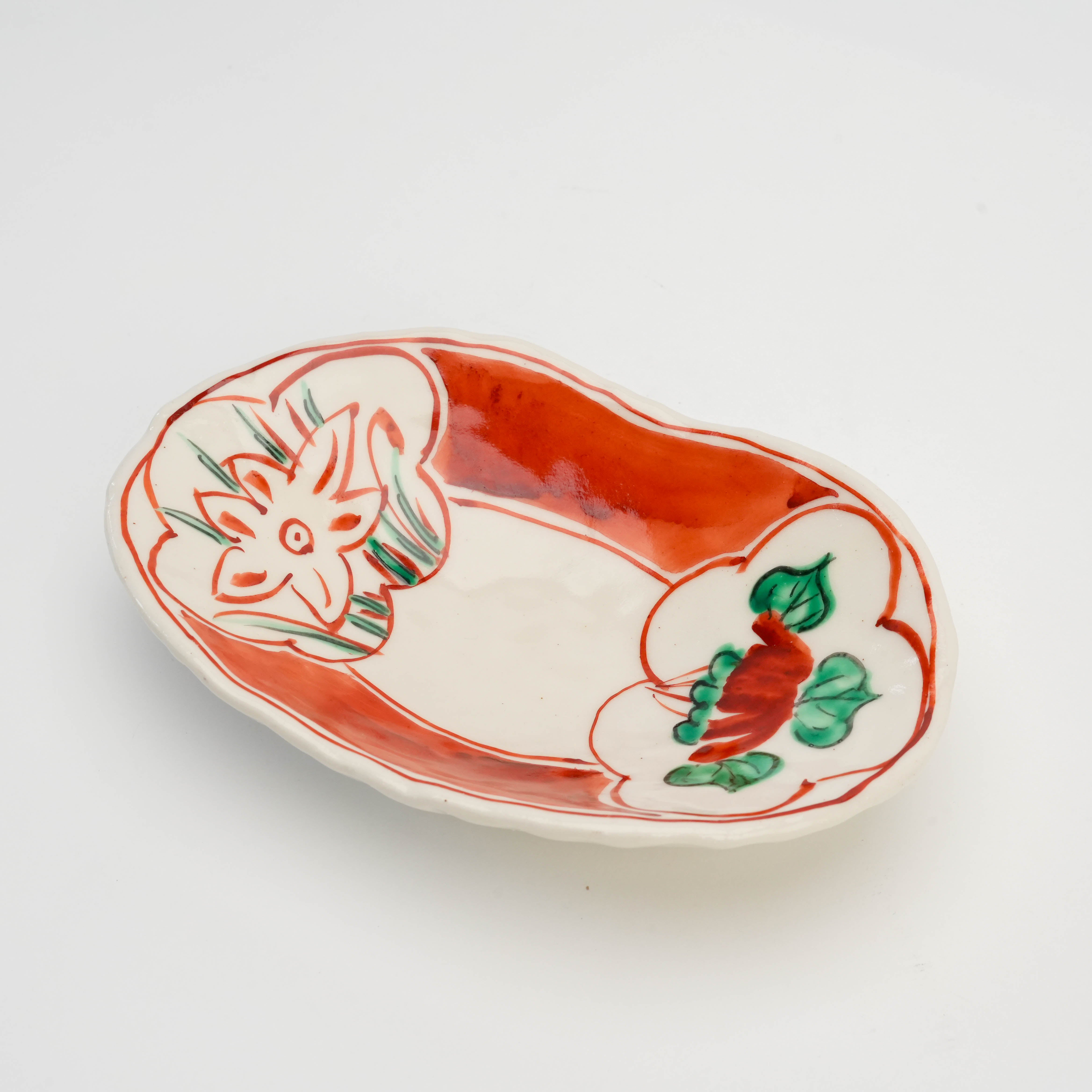 Mino Ware Akae Oval Serving Dish featuring traditional Japanese red patterns and floral accents, perfect for elegant table settings.