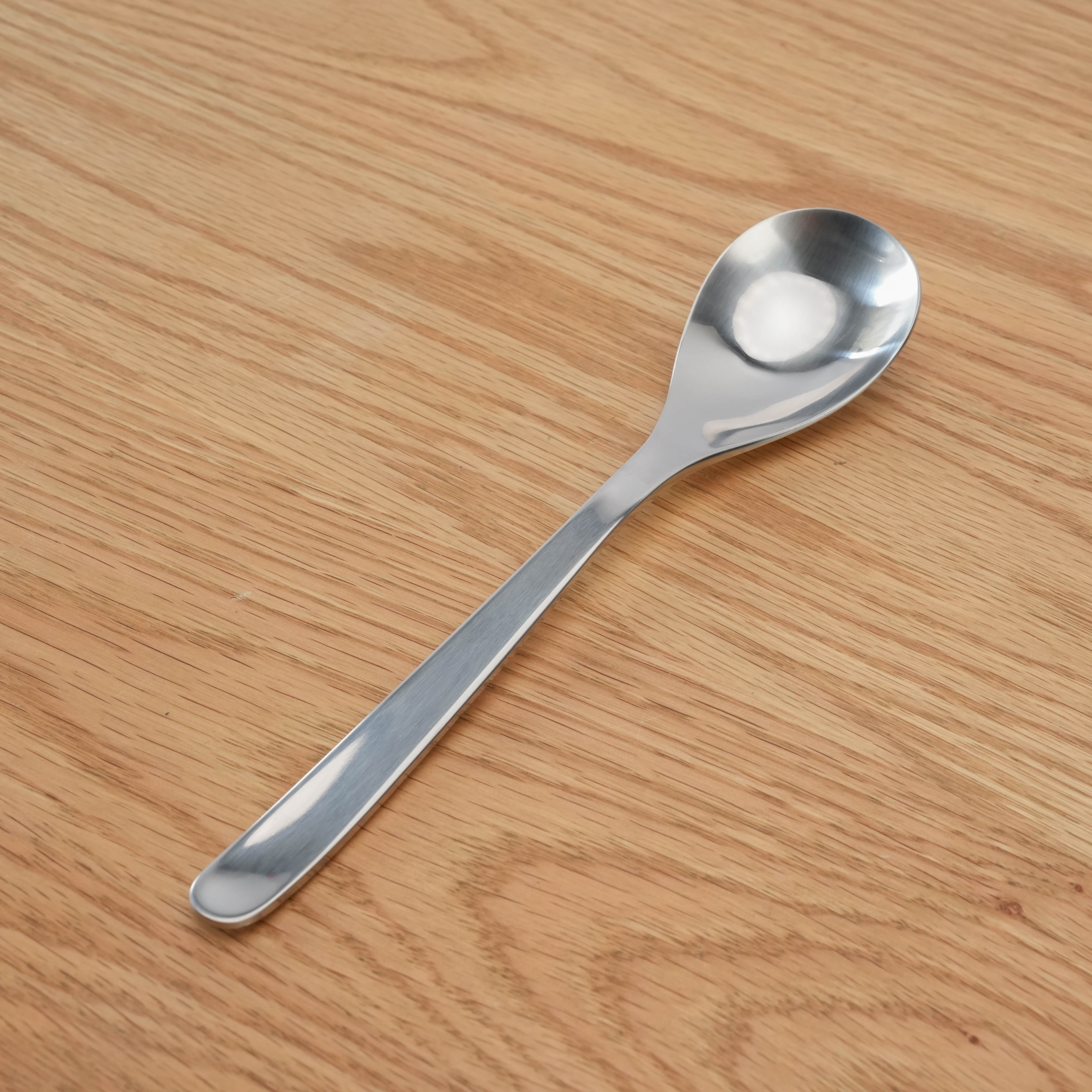 Sori Yanagi Dinner Spoon - Stainless Steel Design with ergonomic handle, ideal for modern kitchens and everyday dining use.