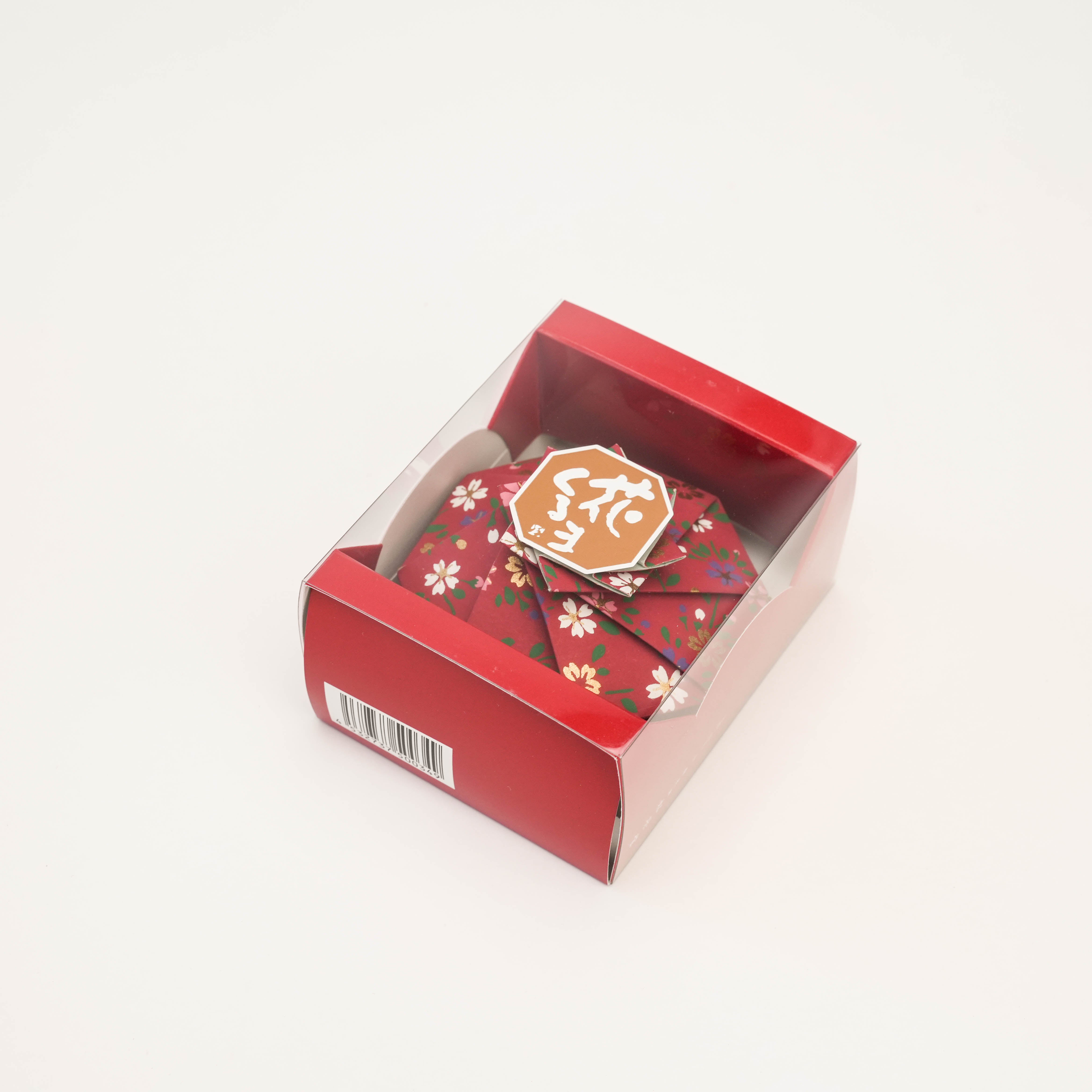 Shoyeido Sachet Flower Wheel in red floral origami, packaged in a clear-front red box, ideal for gifting and air freshening.