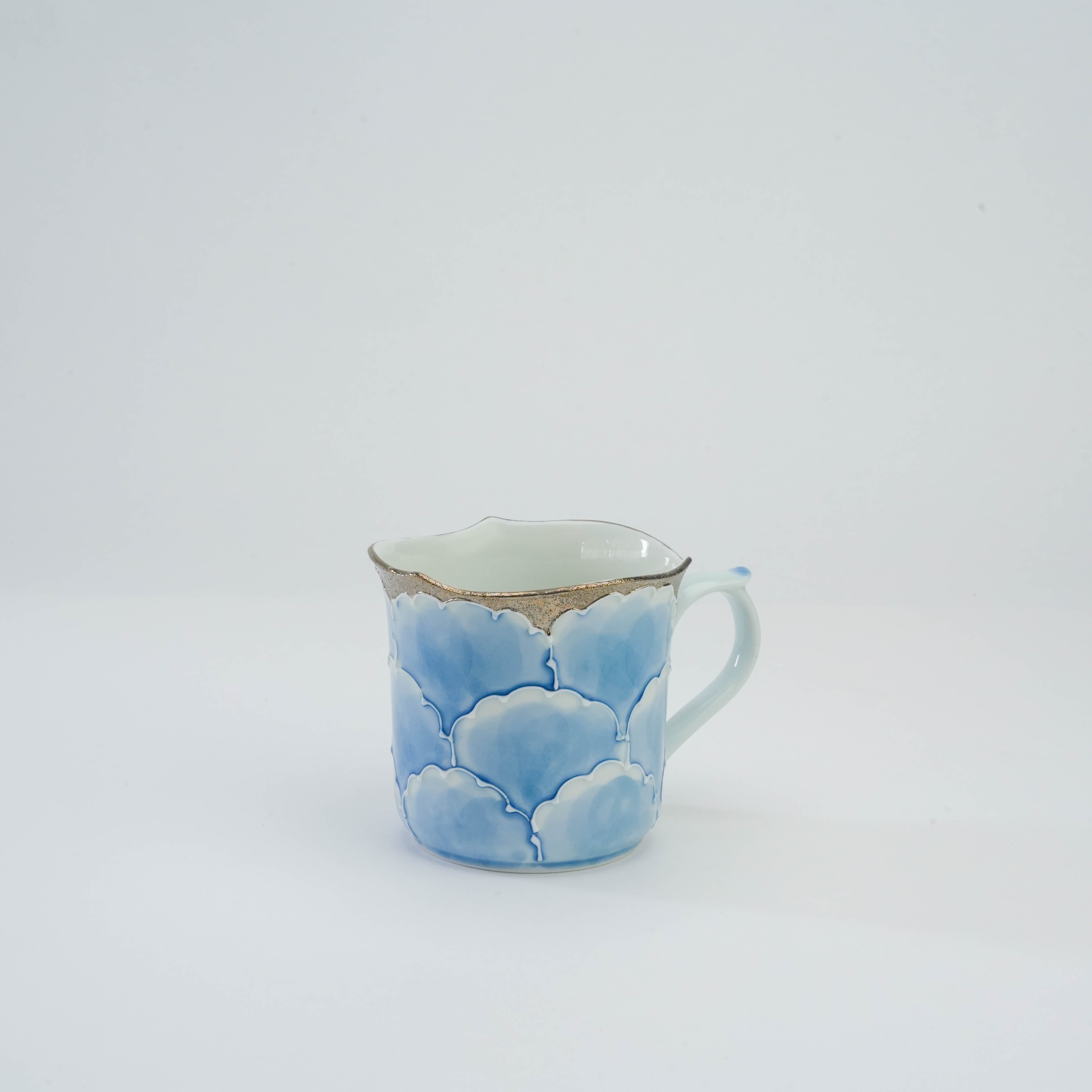 Bunzan Kiln Peony Mug Blue Silver features hand-painted blue peony petals and a silver rim, crafted in traditional Arita Ware porcelain.