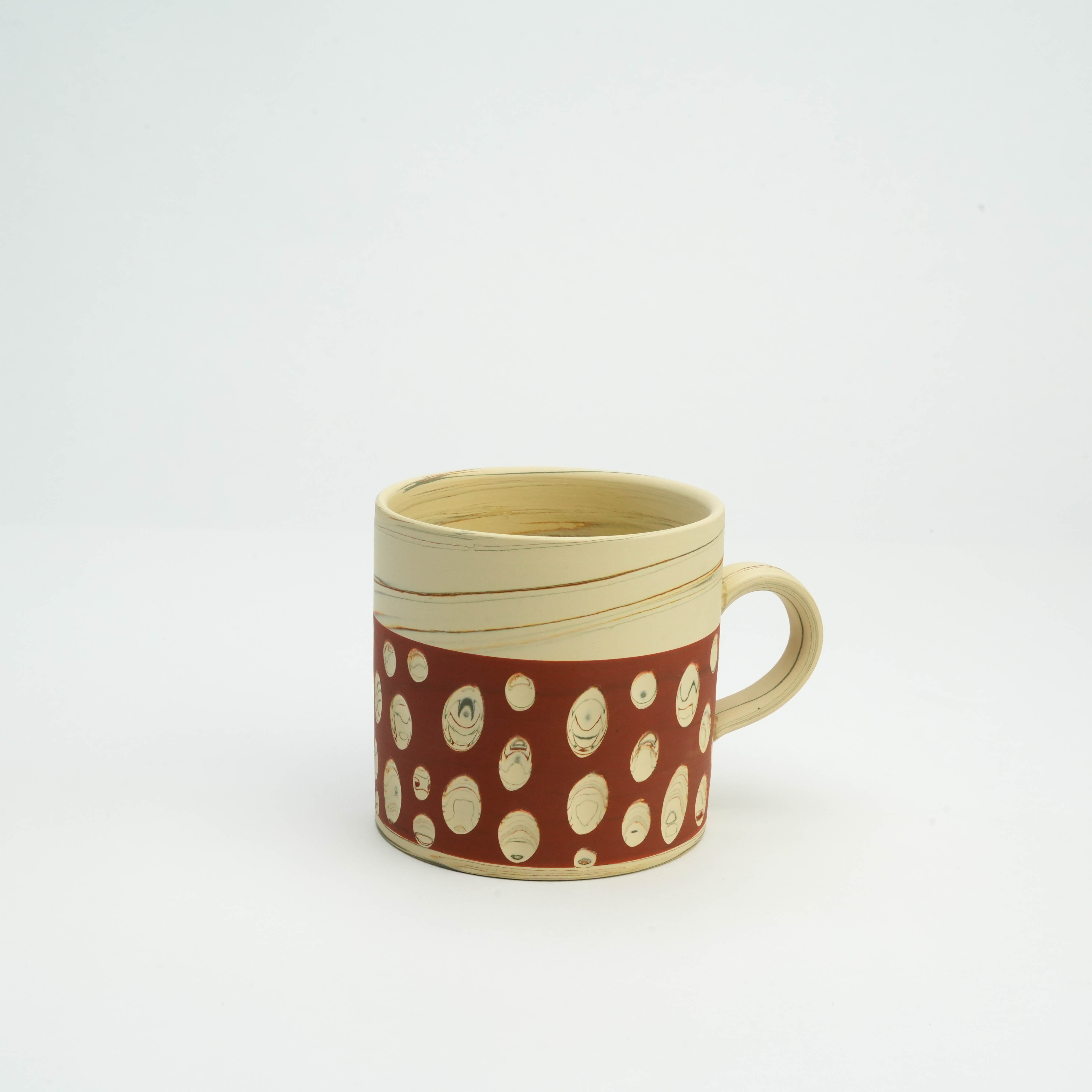 Tokoname Ware Polka Dot Mug in red with handcrafted nerikomi patterns, ideal for artisanal drinkware collections and kitchen decor.
