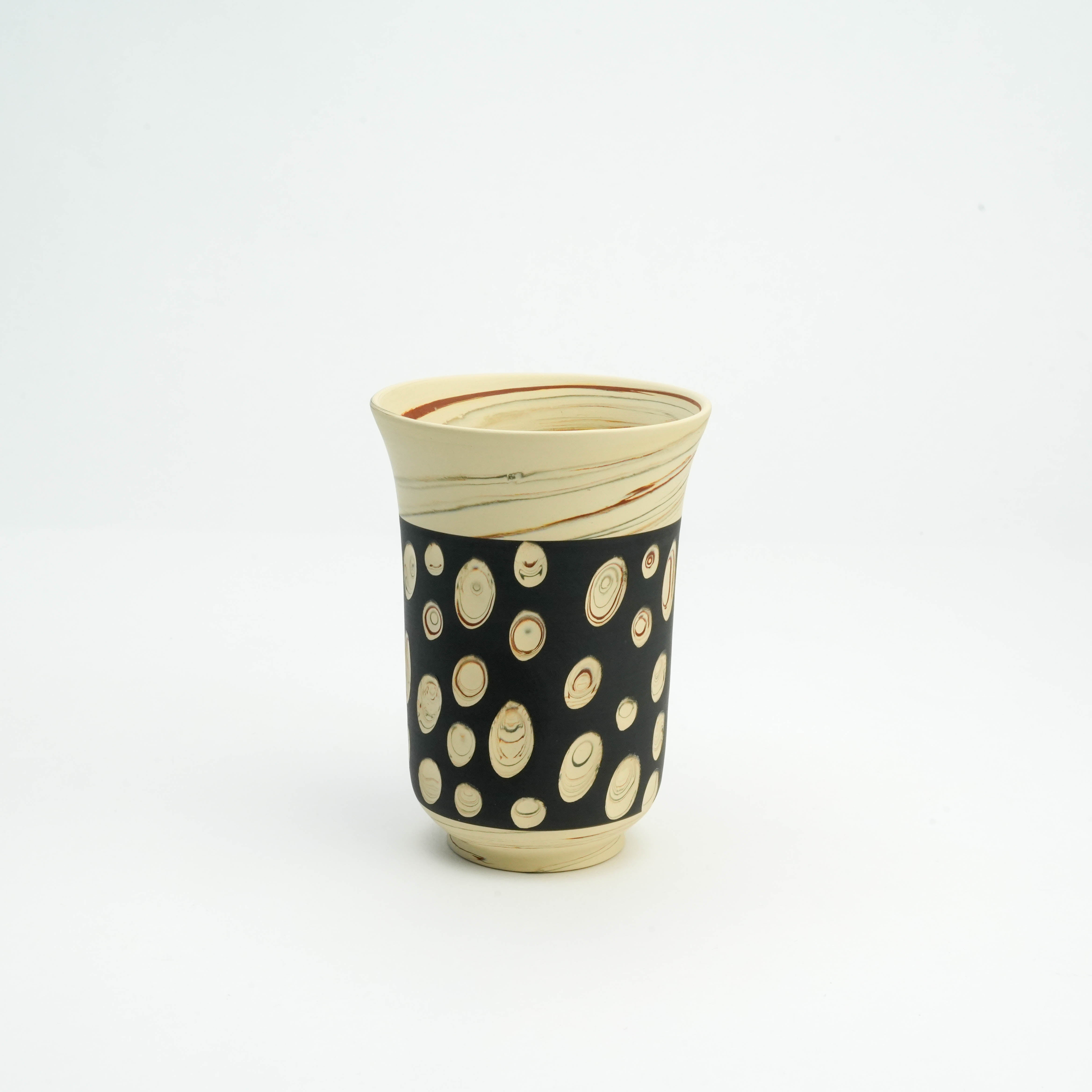 Handcrafted black polka dot tumbler by Kenji Touen featuring nerikomi patterns, part of Tokoname Ware drinkware collection.