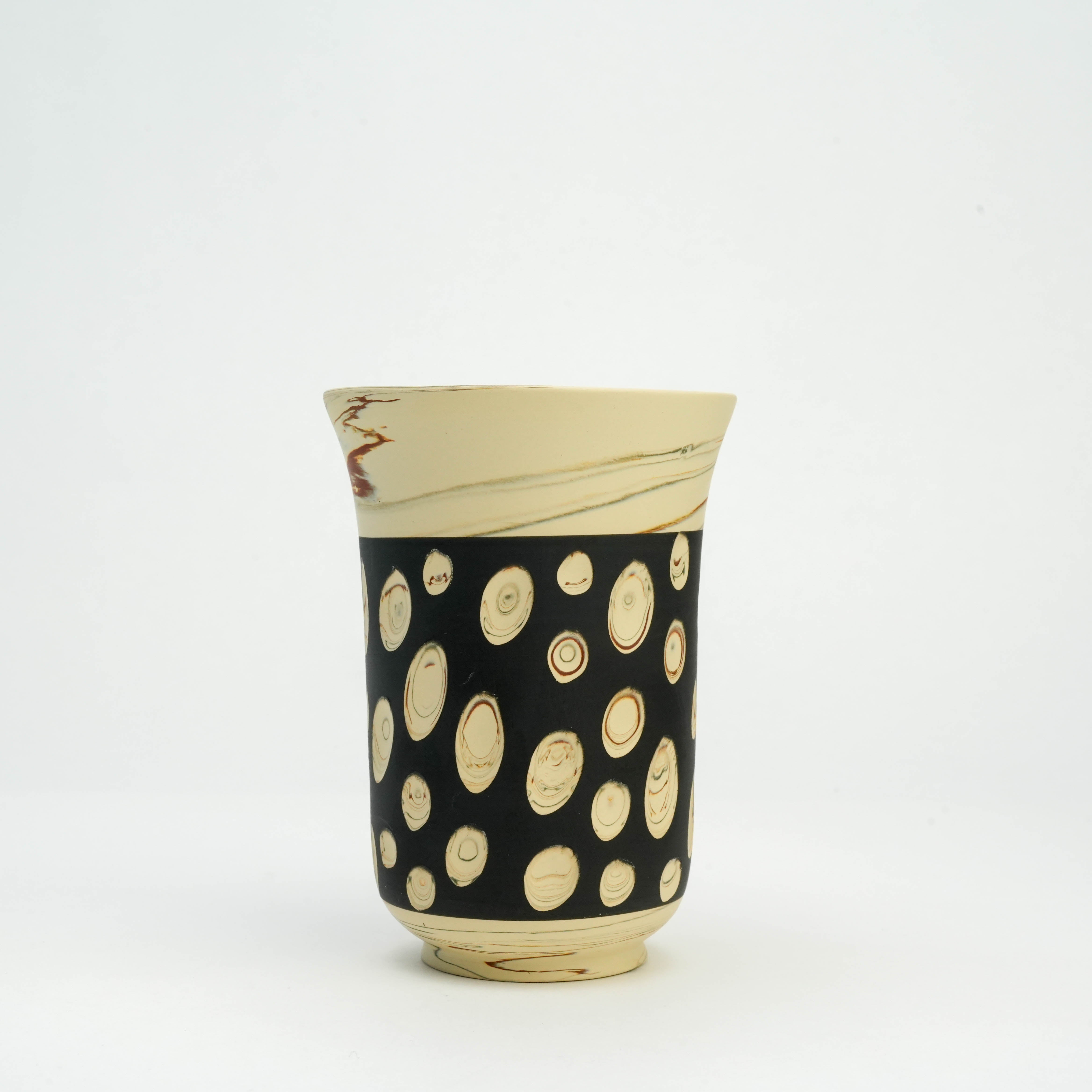 Tokoname Ware tumbler in black with handcrafted nerikomi polka dots, ideal for modern kitchen and dining aesthetics.