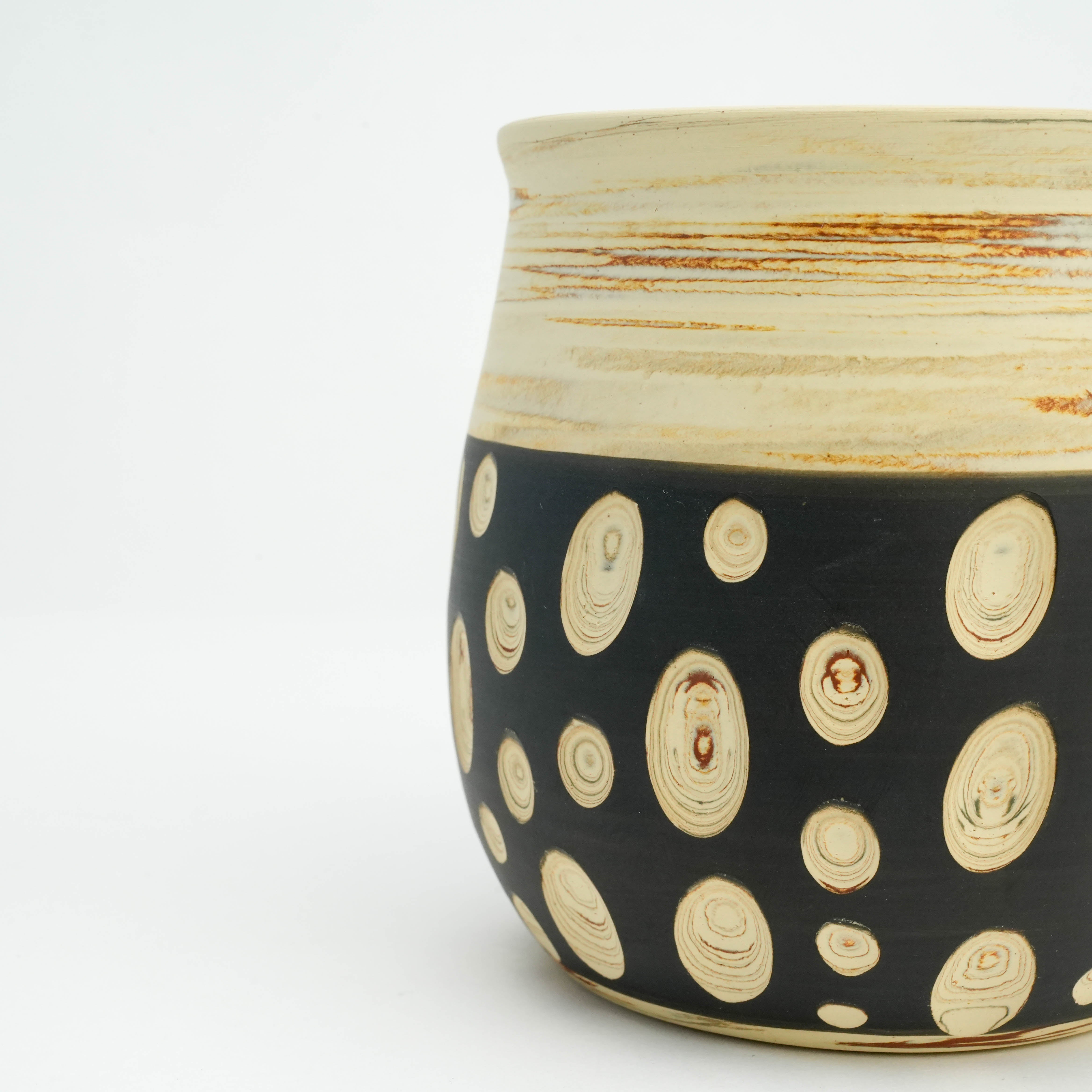 Side detail of Tokoname Mug - Handcrafted Ware | Polka Dots, Kenji Touen featuring black base with unique cream swirl dot accents.
