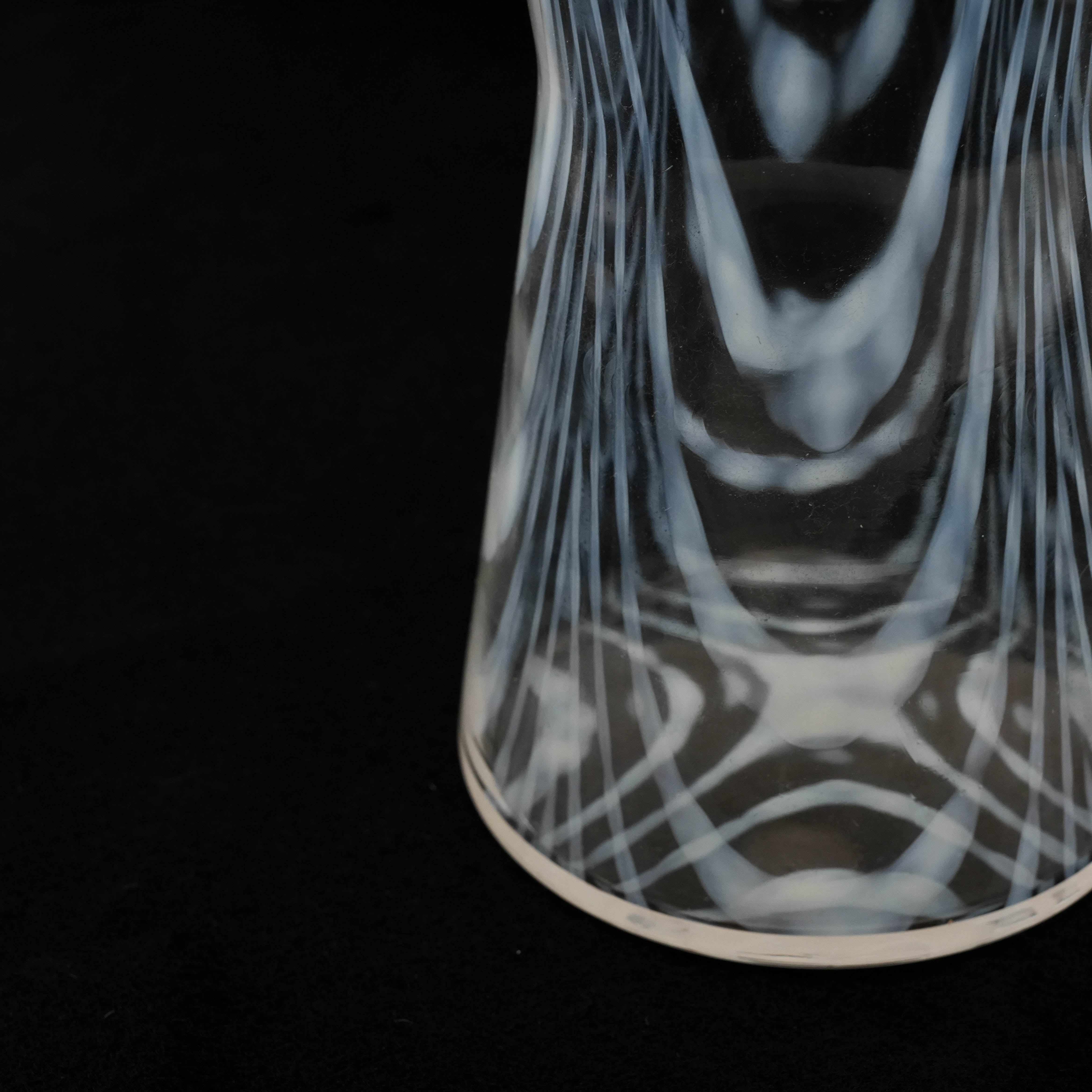 Lower section of the Hirota Glass Taisho Roman Carafe - Winding, highlighting the detailed hand-blown glasswork and swirling design.